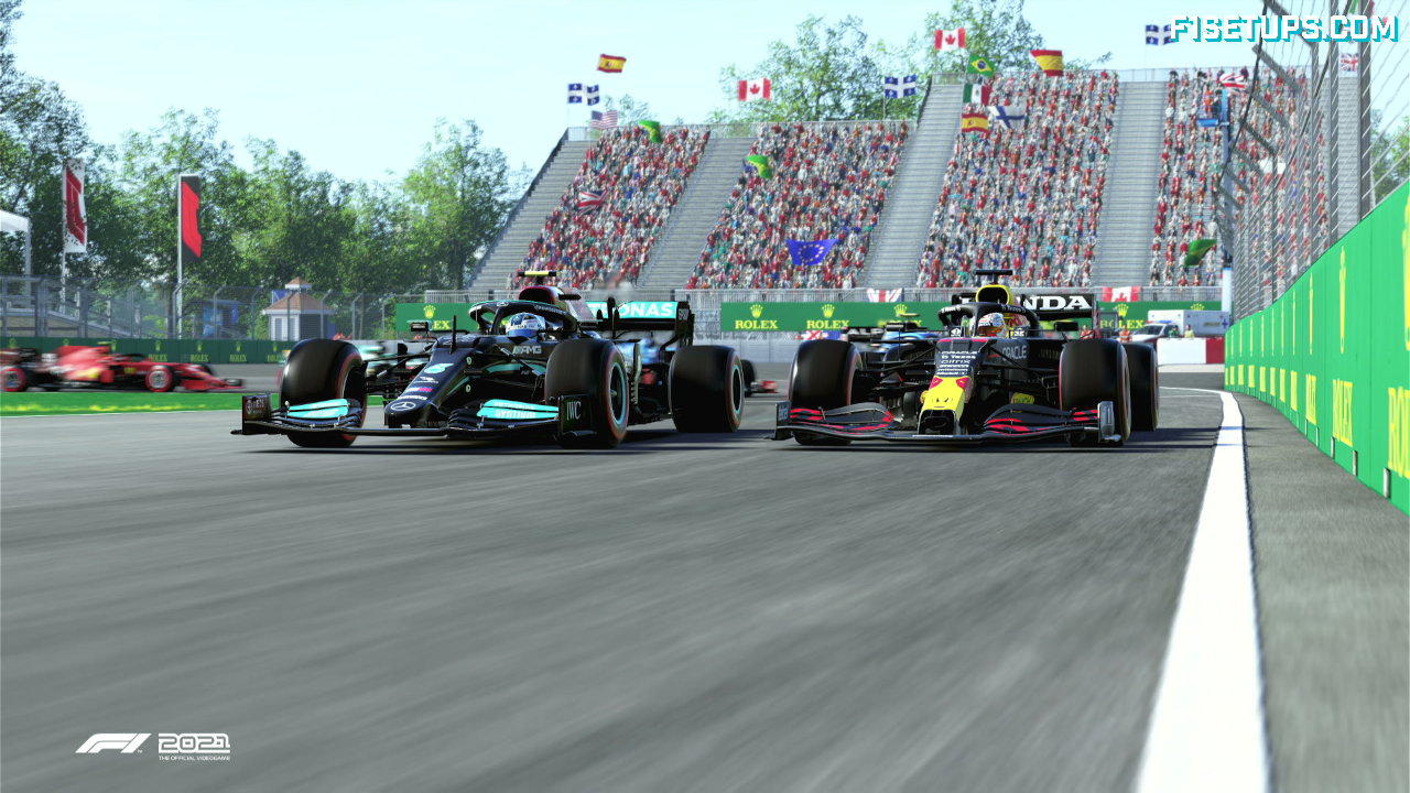 A group of F1 cards on the start/finish straight at the Singapore GP circuit. Shot in F1 2021 game. 