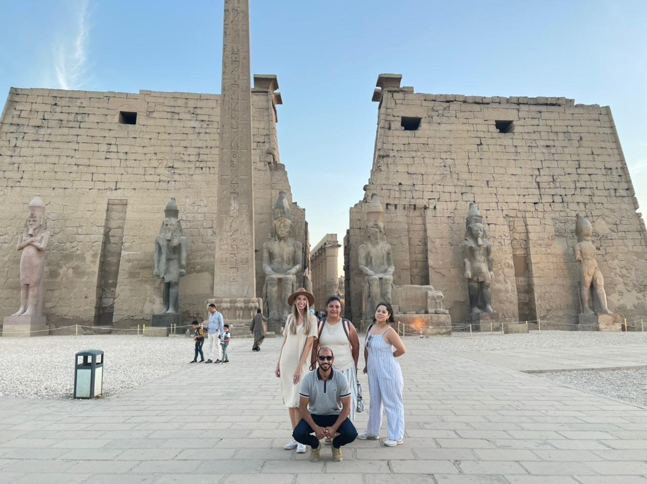  Standing in front of Luxor temple in Luxor, Egypt with my tour guide and group. A stop over from our Nile Cruise 
