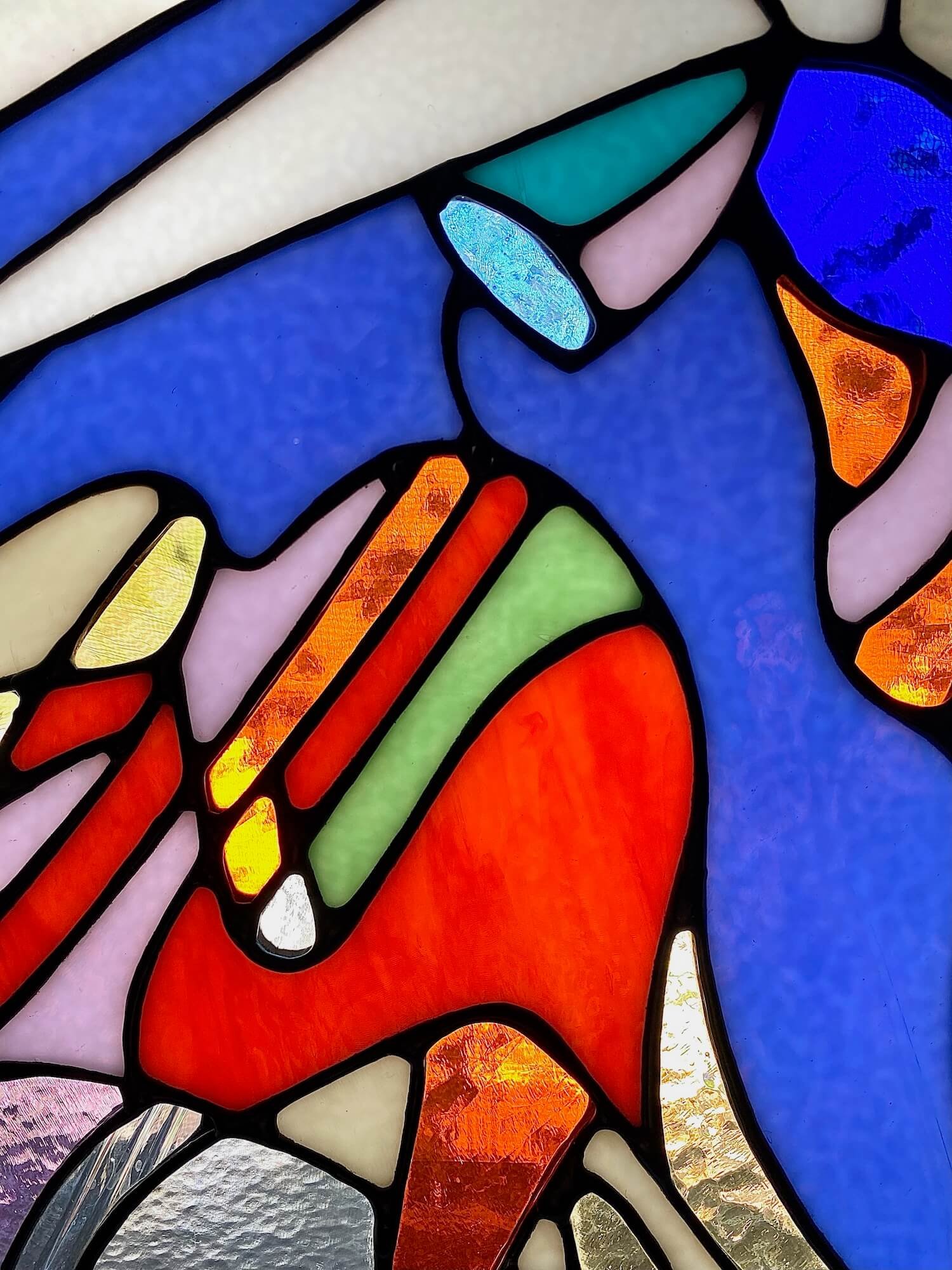 Abstract stained glass panel made by Ann Weinheimer in Wheat Ridge, Colorado.