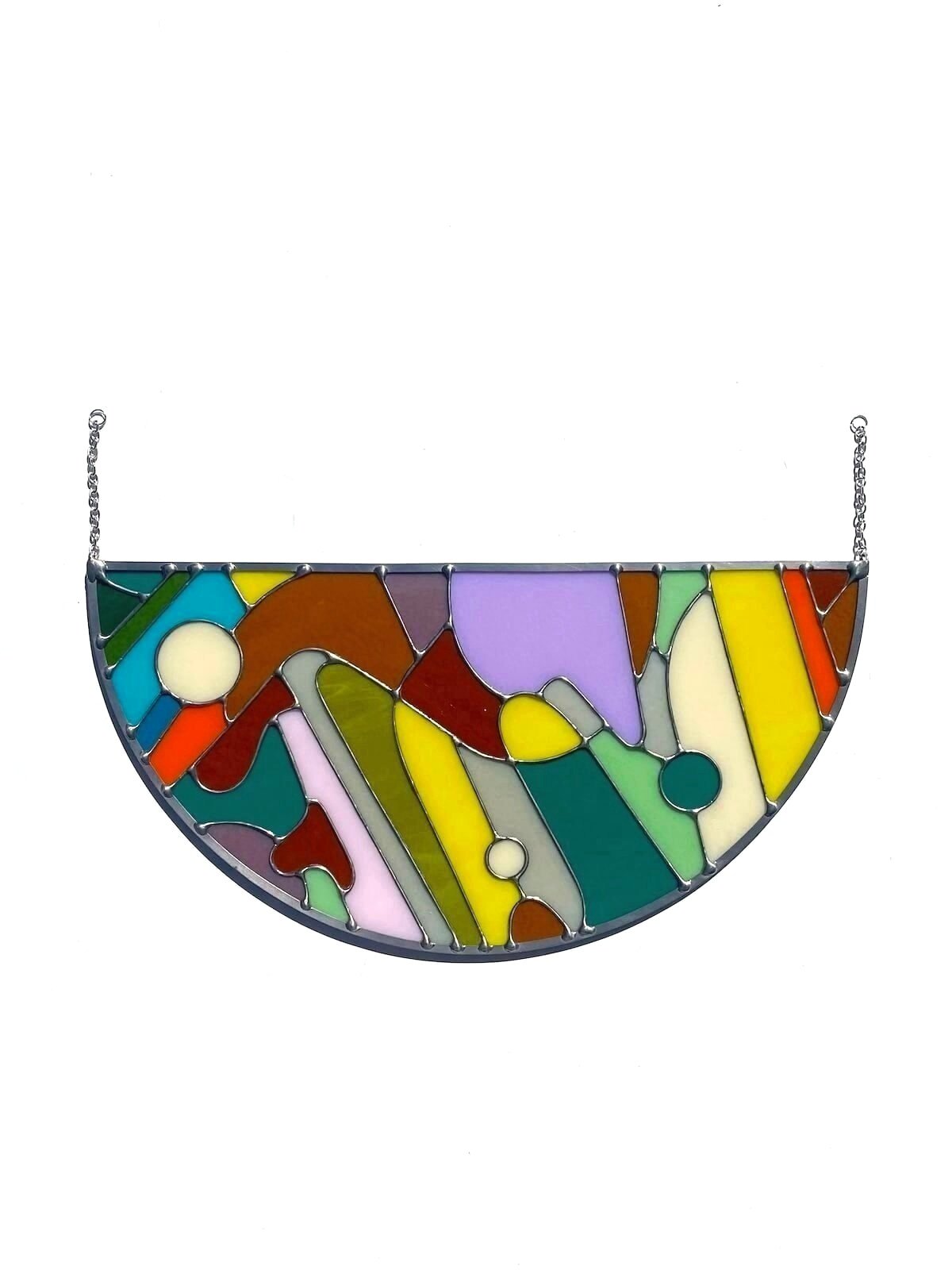 Abstract stained glass artwork made by Ann Weinheimer in Wheat Ridge, Colorado.