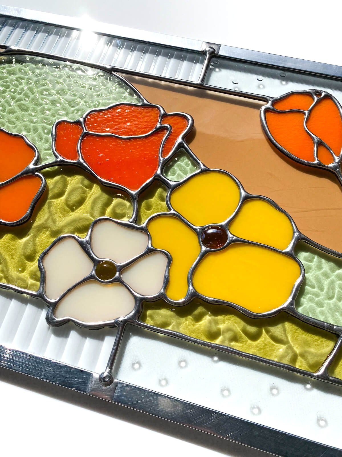 California poppy stained glass panel made by Ann Weinheimer in Wheat Ridge, Colorado.