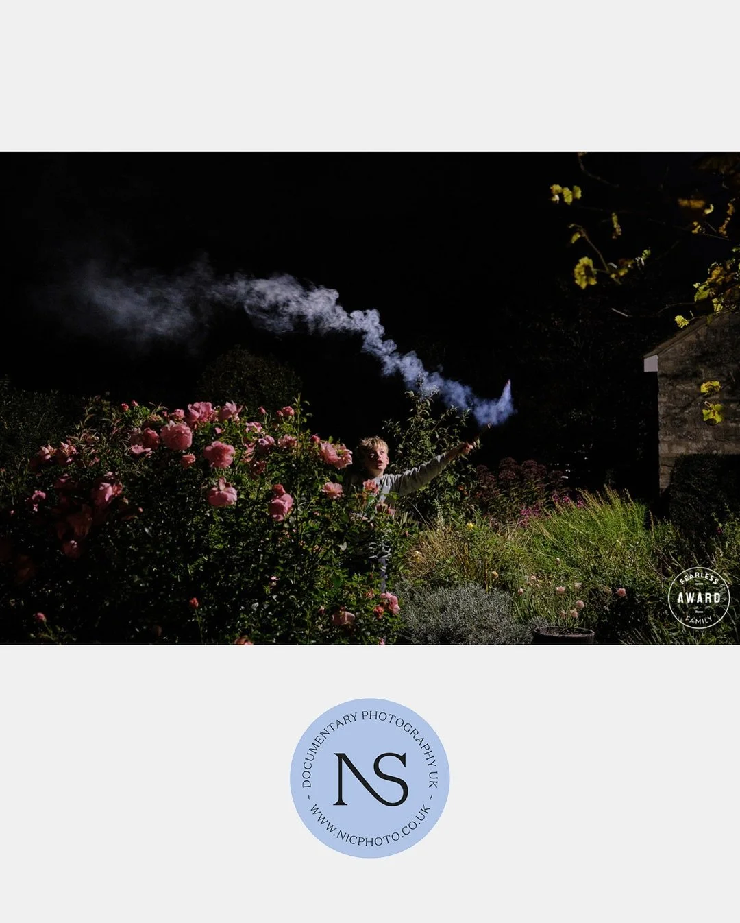 So honoured to have received an award for this image from @fearlessfamilyphotos thank you so much to the judges 🤍.

An image of Wilson on &lsquo;fire night&rsquo; burning sticks in the garden, lit by the security light.

#familydocumentaryphotograph