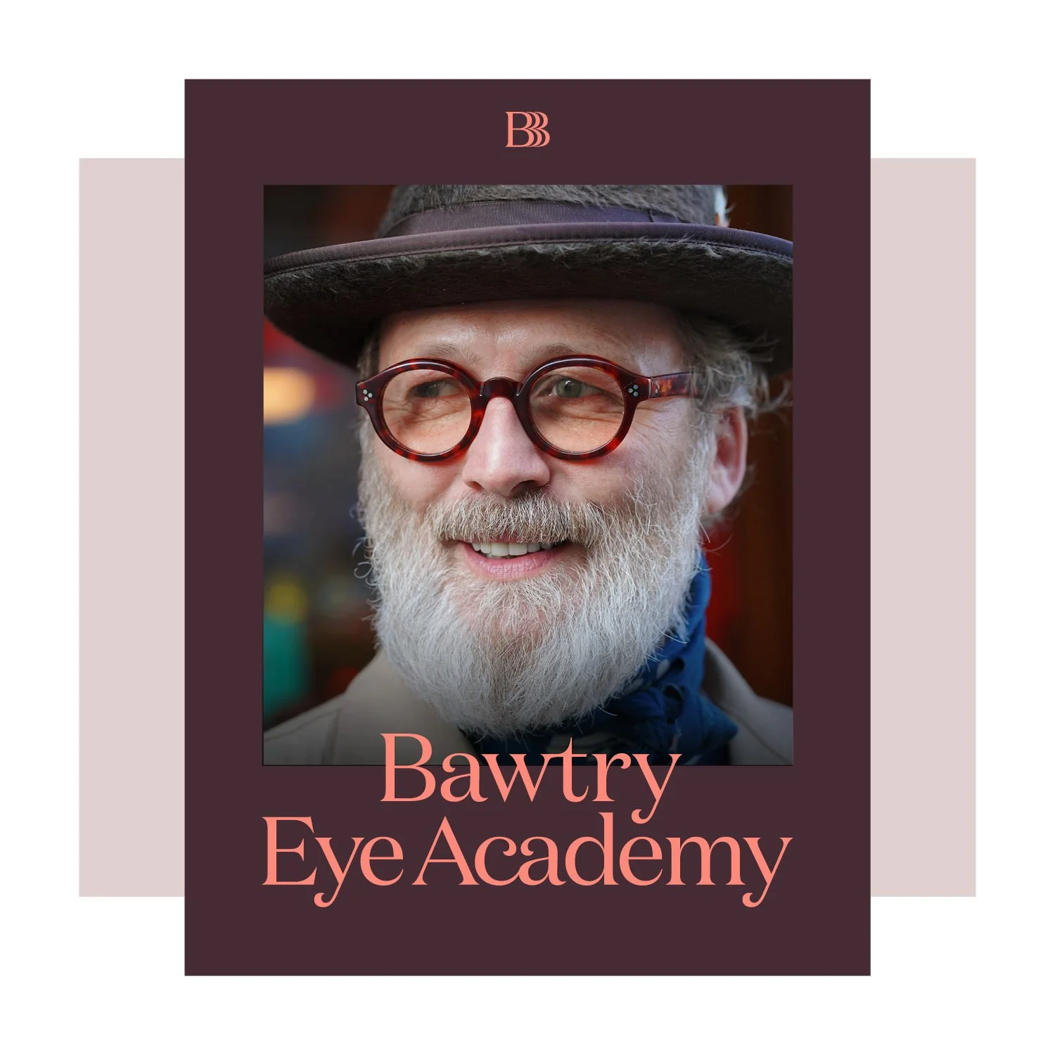Close-up of an older man with a gray beard, wearing red tortoiseshell eyeglasses, a wide-brimmed hat, and a blue neckerchief. The background is blurred. The image is part of a promotional material for Bawtry Eye Academy.