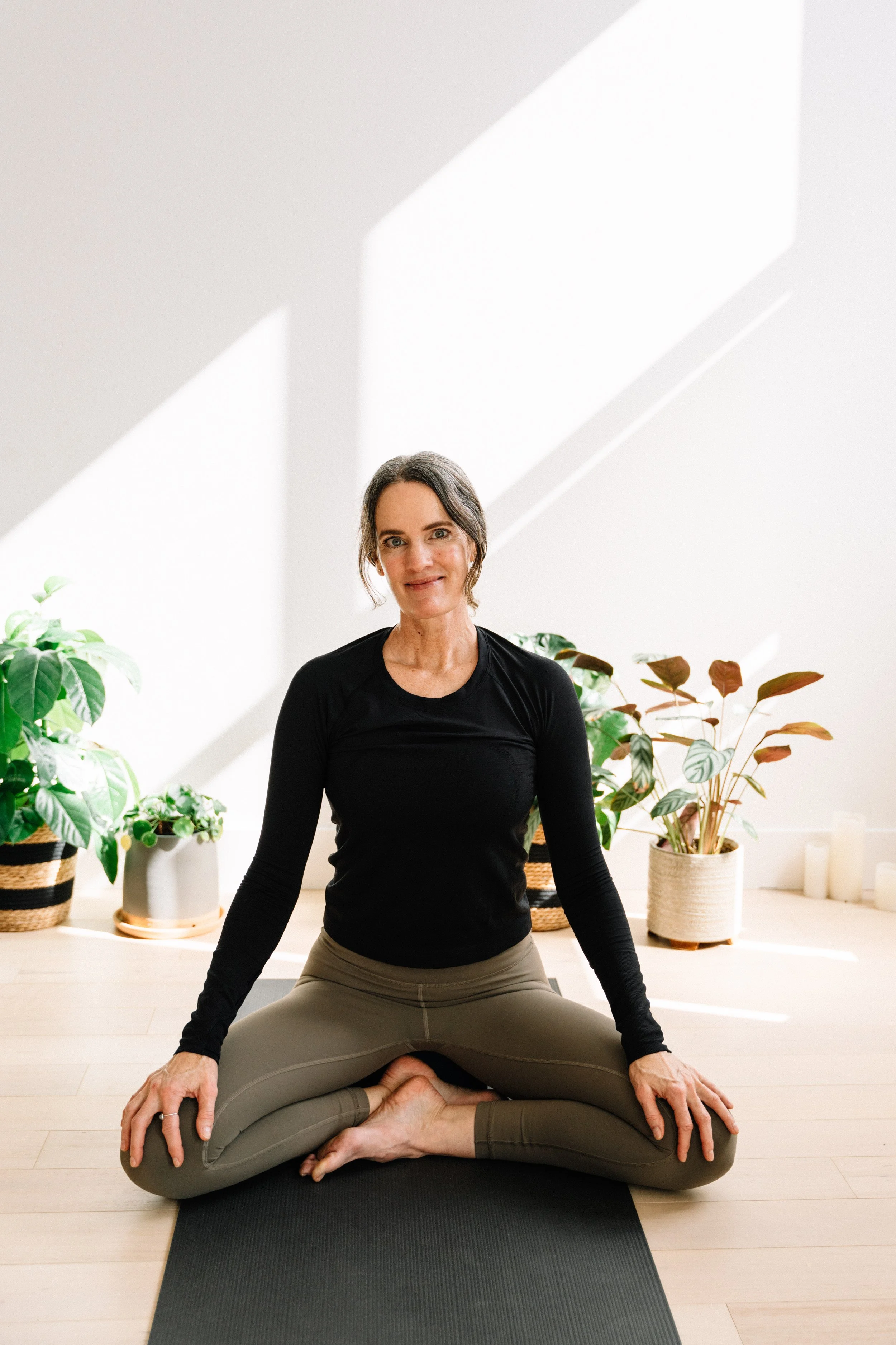 A meditator seated in the LYC studio