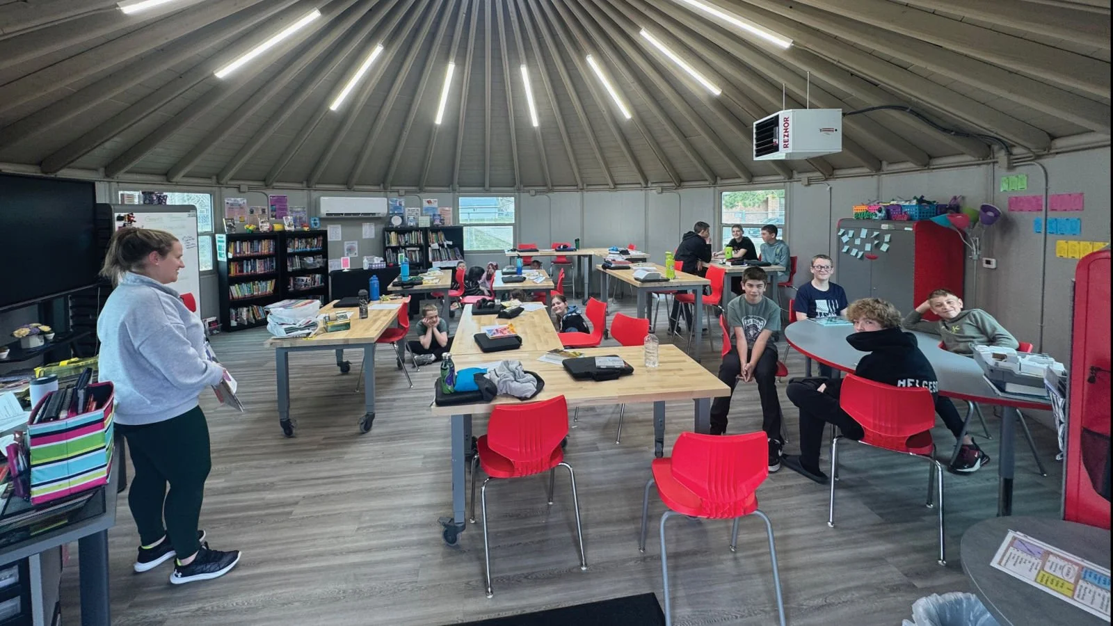 The inside of a yurt classroom.