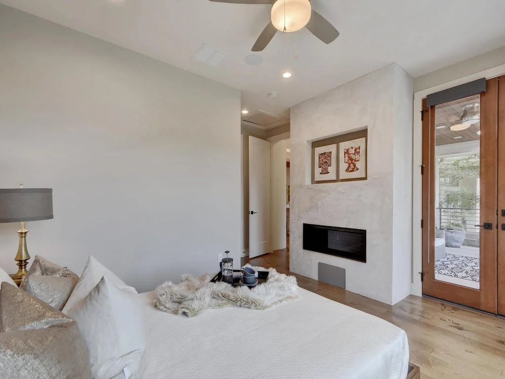 Bungalow-Remodel-Kemah-TX-Modern-Home-bedroom-fireplace