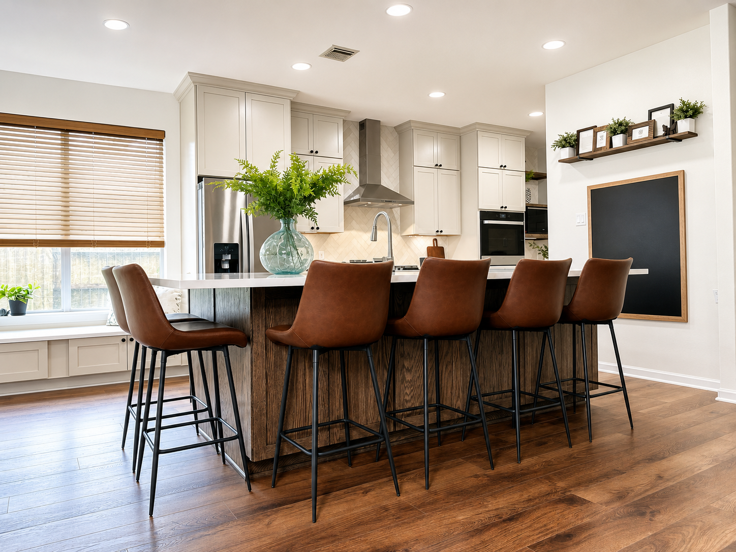 Custom kitchen island with dark stained oak cabinetry and quartz countertop in League City kitchen remodel