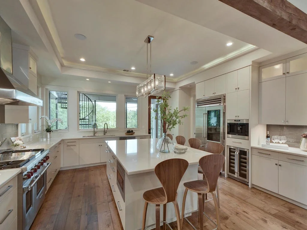 Bungalow-Remodel-Kemah-TX-Modern-Home-oversized-kitchen-island-white