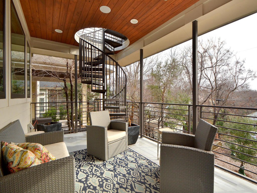 Bungalow-Remodel-Kemah-TX-Modern-Home-spiral-stairs-patio