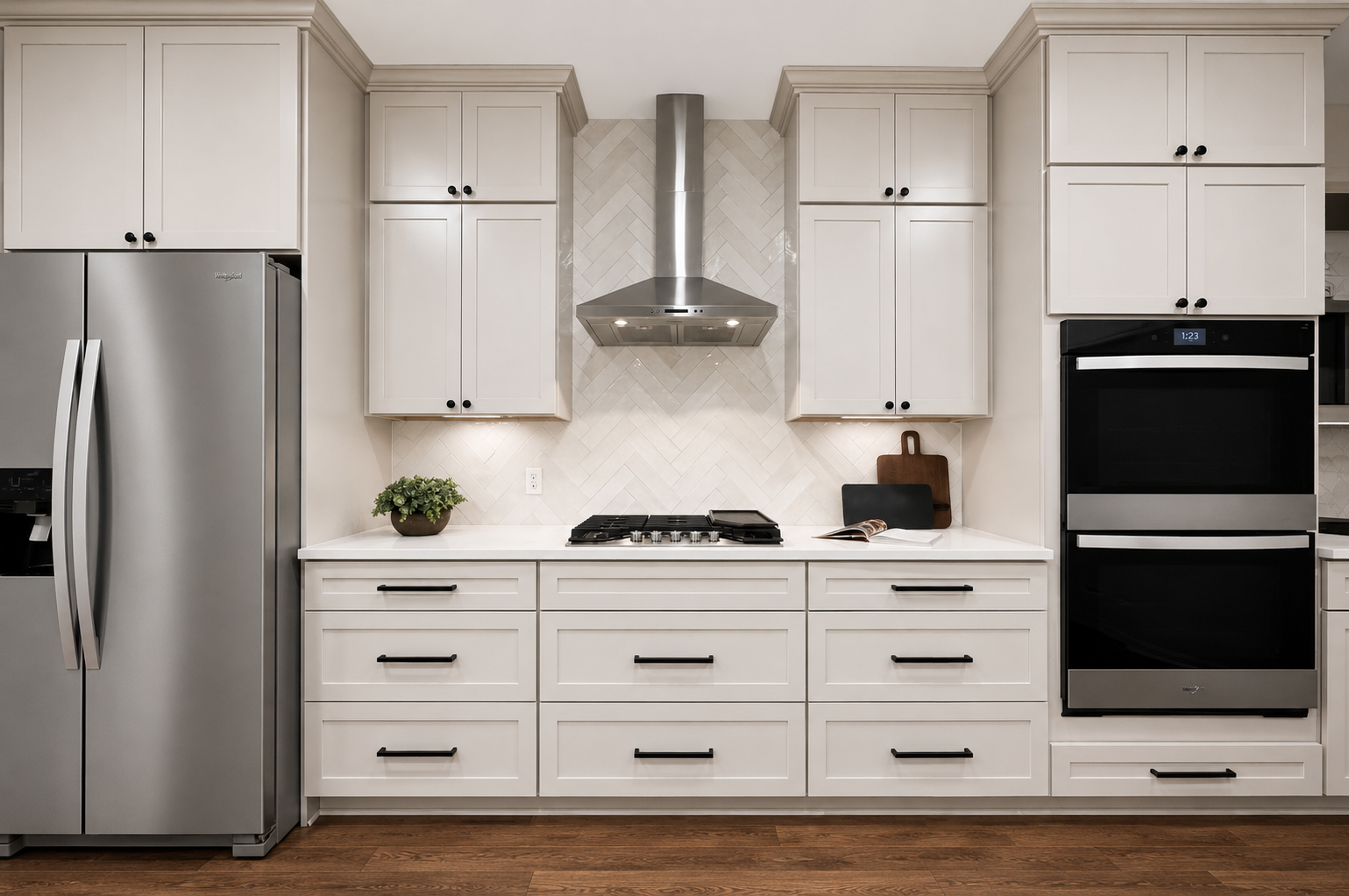 Ivory tile backsplash and custom range hood in warm oak kitchen renovation