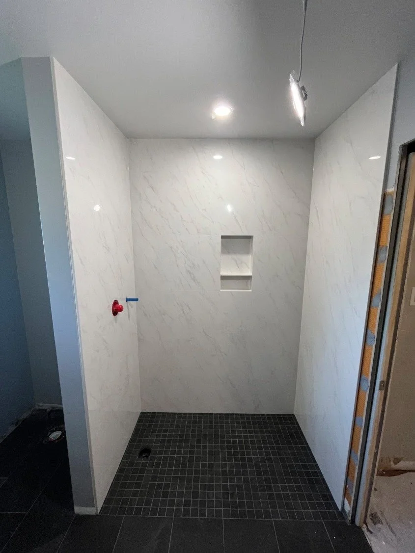 If you're re-modeling your bathroom, skip the tile and get a One-Piece Stone Shower!

Why Stone (Pro) Wins:

NO Grout: That's right&mdash;ZERO seams to scrub. Cleaning is a quick swipe! 🧼

No Leaks: It's a single, solid piece. Super waterproof. 💧

