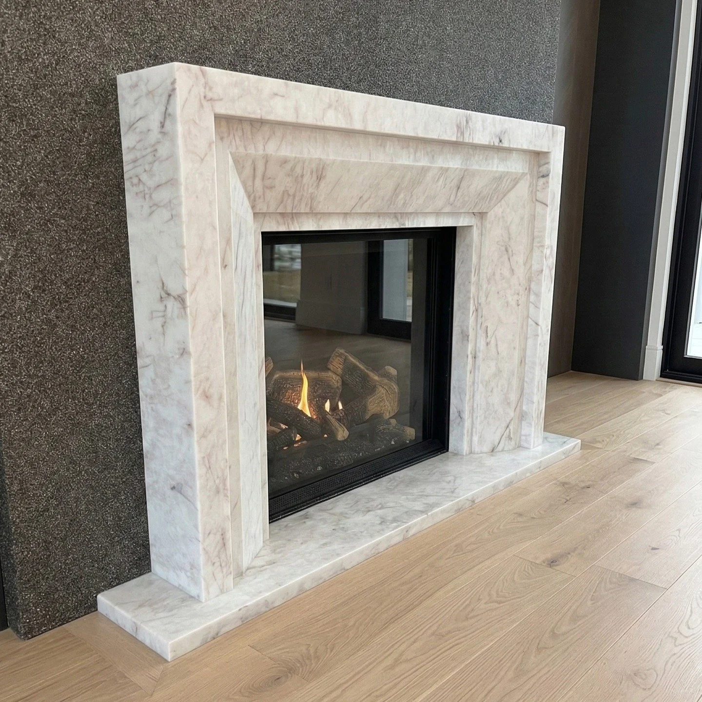 Iceberg Quartzite: A labor of love (and a lot of sweat).

50+ hours of shop labor. Infinite hours of appreciation. This custom surround sourced from @OlympiaTile is easily one of our most intense builds to date.

Thinking Stone? Think the Pro's at St