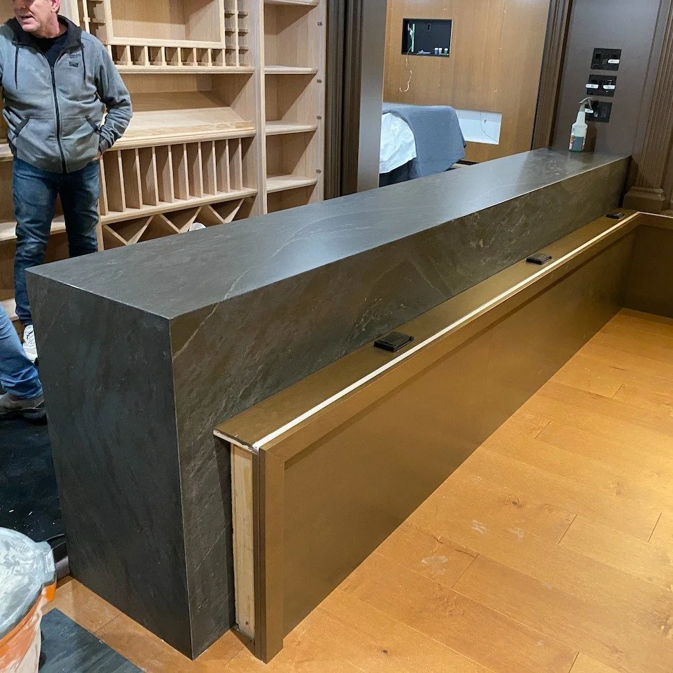 This picture is an example of what it means to:

1. Have great clients who trust you with high-end projects
2. Employ installers with the highest skill set with years of experience.
3. Love your job! Because who wouldn't be proud of installing someth