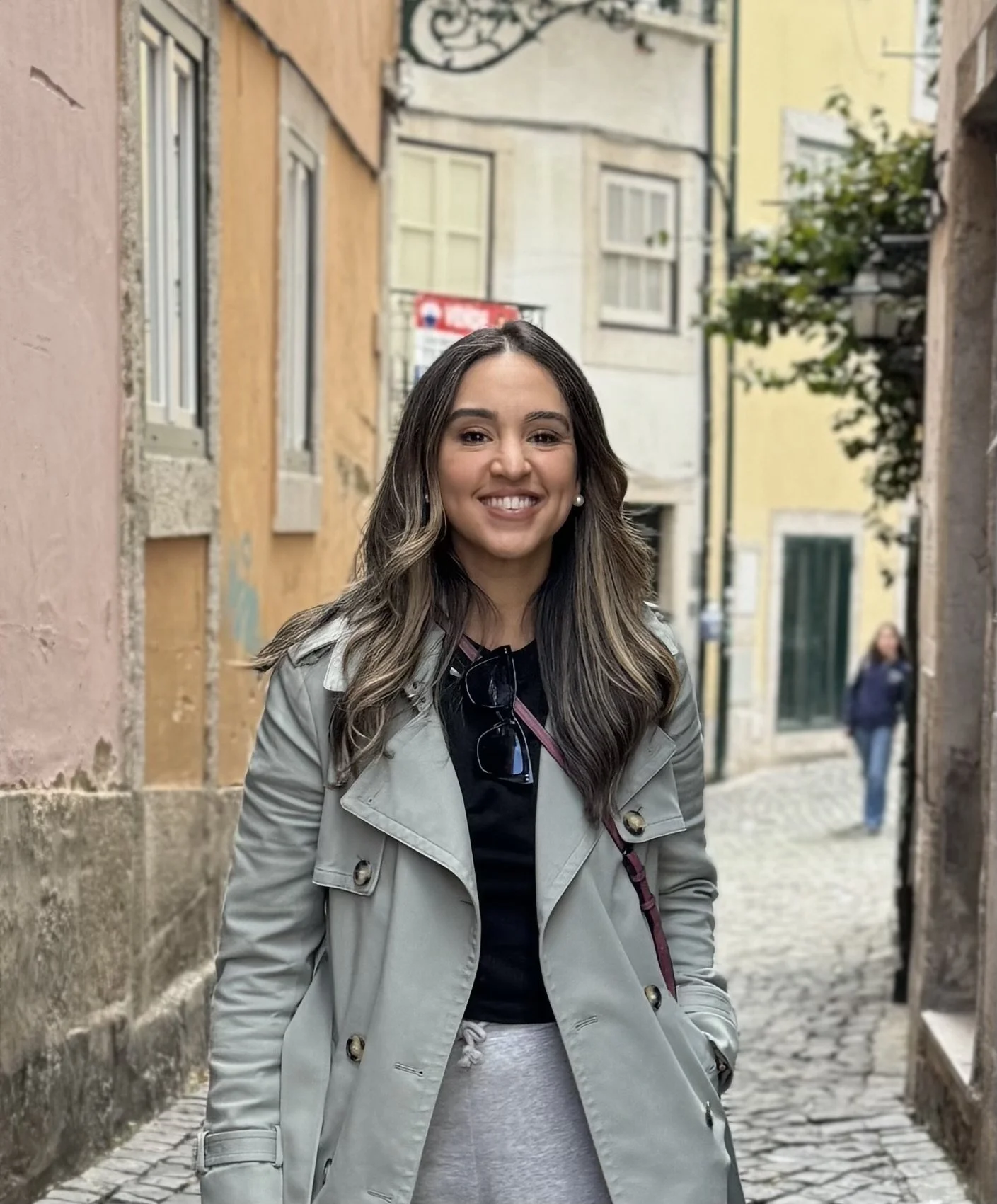 Ardis Ruiz outdoors with a baby