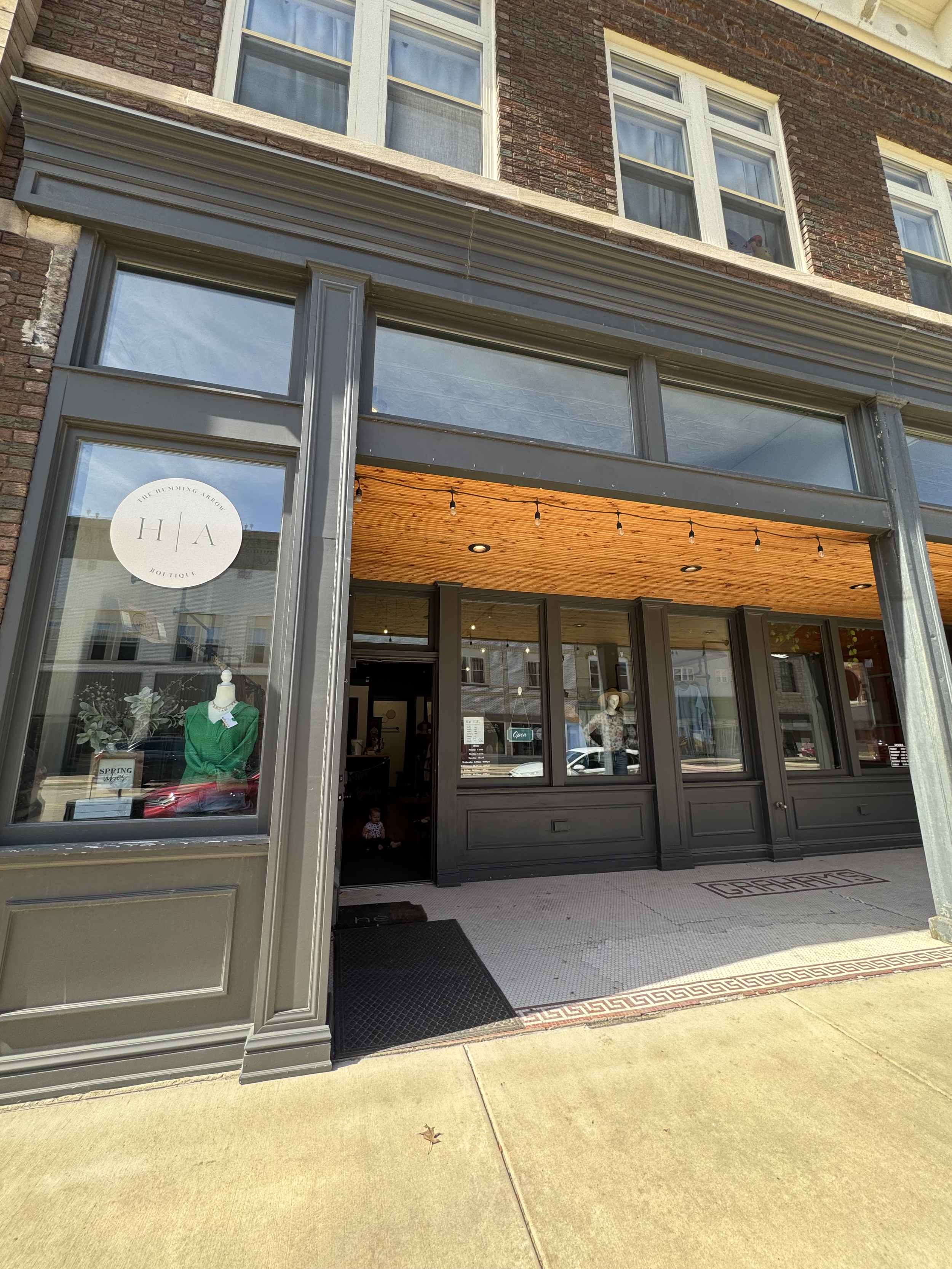 The Humming Arrow Boutique in Maquoketa, Iowa offers clothing for women of all sizes, home goods, baby items, and local skincare.