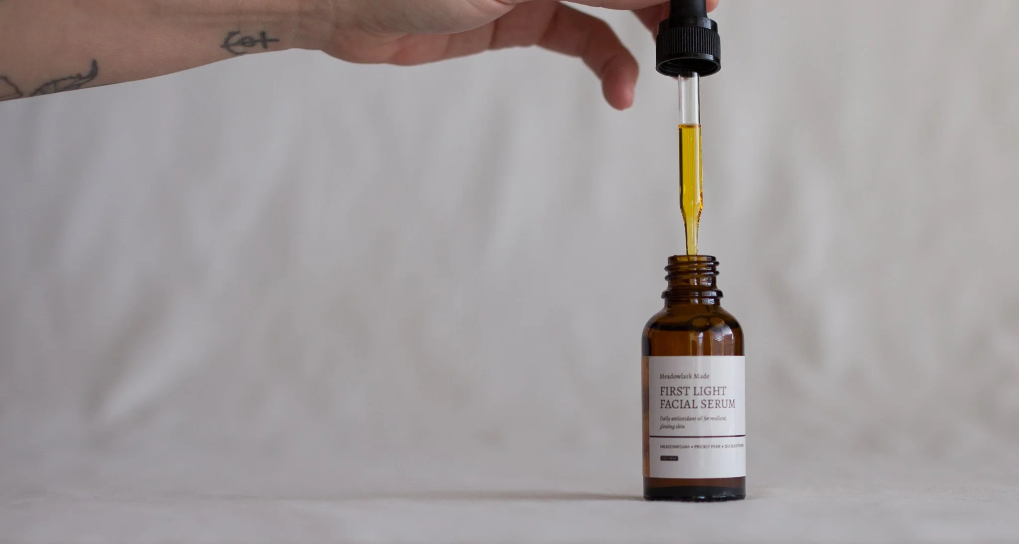 Meadowlark Made First Light antioxidant morning facial serum made in small batches with holistic esthetician background to support the skin barrier through stress, sun, and the elements.