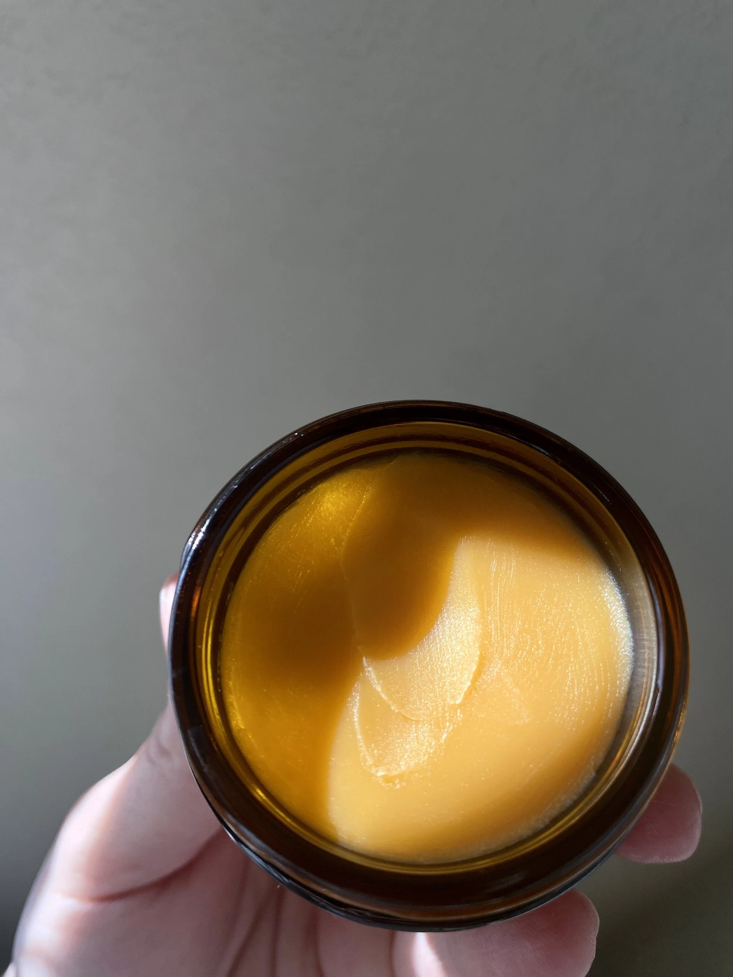 Warming herbal skin salve for aching joints and sore muscles