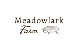 Meadowlark Farm specializes in pasture-raised heritage Kunekune pork, raised locally on their Veteran-owned small family farm