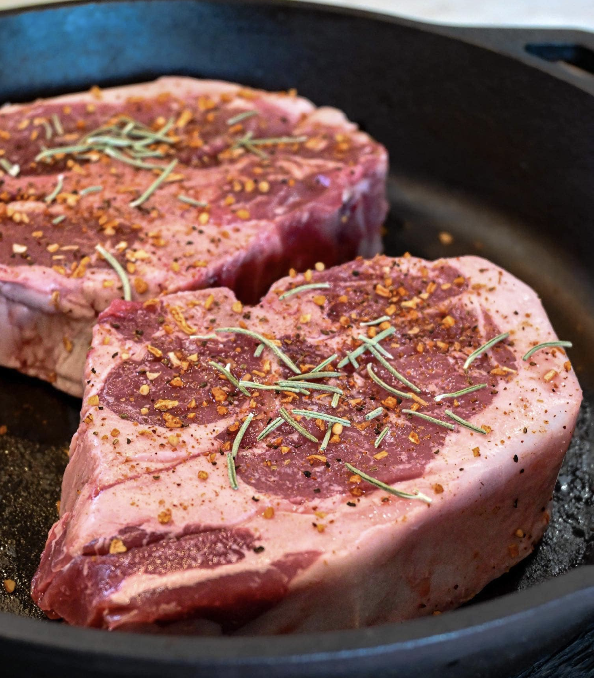 Richly flavored, beautifully marbled, nutrient-dense pork chops raised on pastures at Meadowlark Farm in Iowa