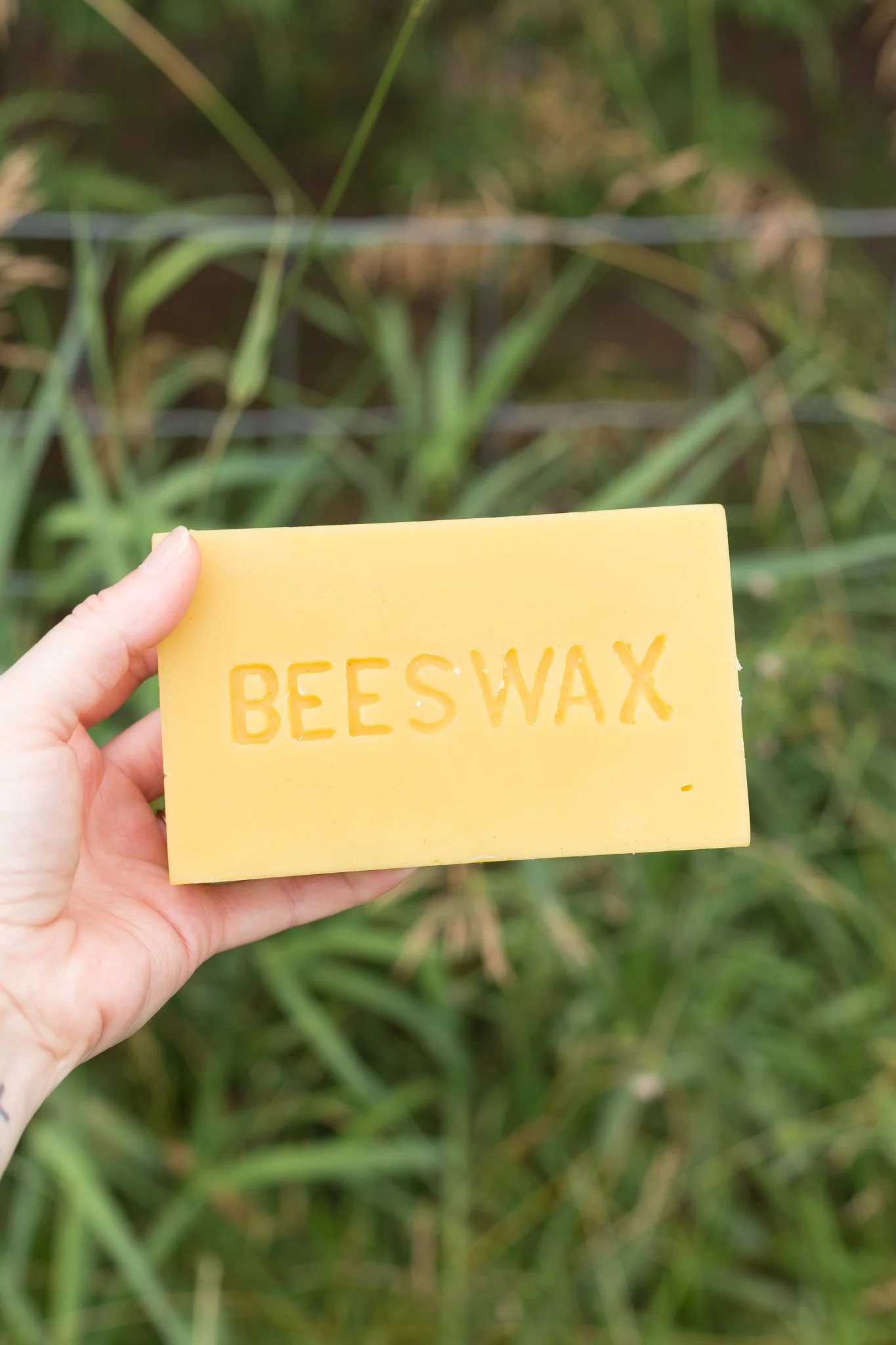 Block of beautiful golden beeswax from local Iowa apiaries used for Meadowlark Made skincare