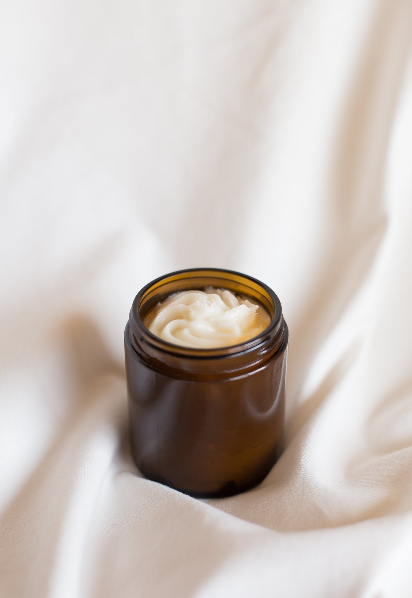 Close-up image of a jar of whipped pasture-raised pork tallow
