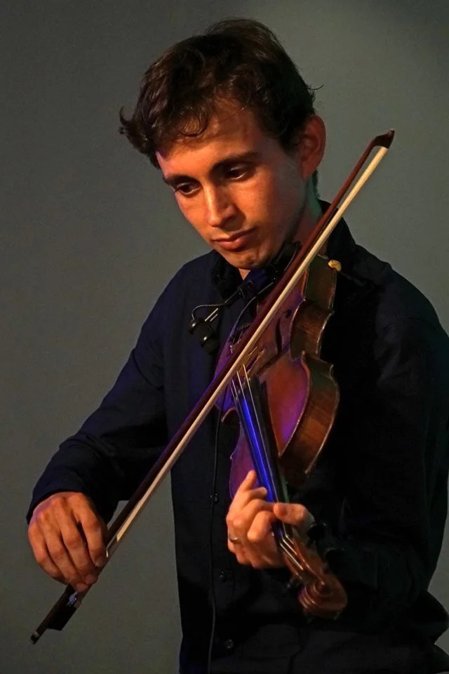 Great-jon-head-shot-fiddling copy.jpeg