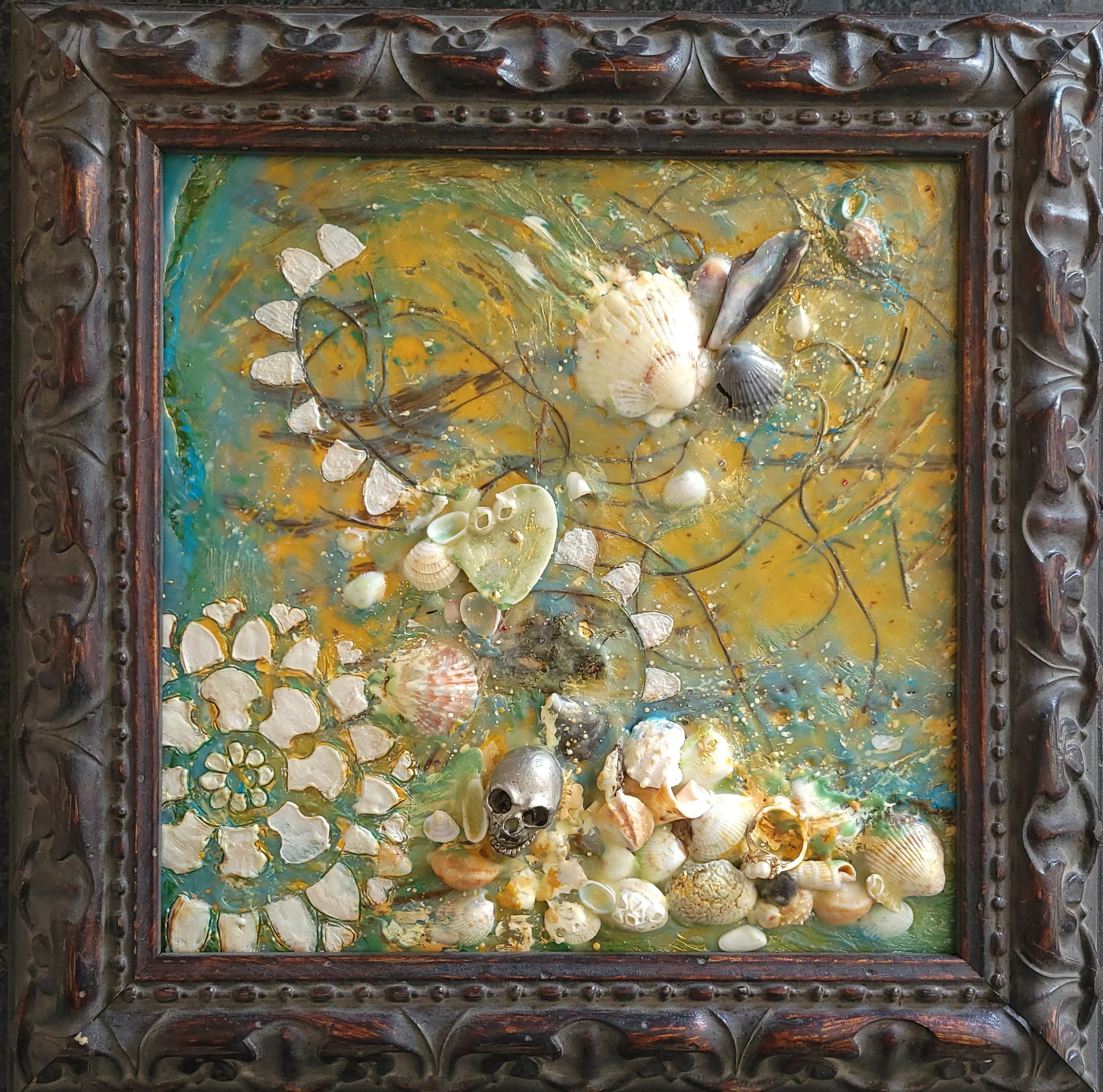 Jewels of the Sea ($250) Encaustic mixed media using seaweed, shells, discarded jewelry, metal, gold ring with pearls and cubic zirconia, oil stick, and micro crystals.
Size: 12.5 x 12.5 in with frame