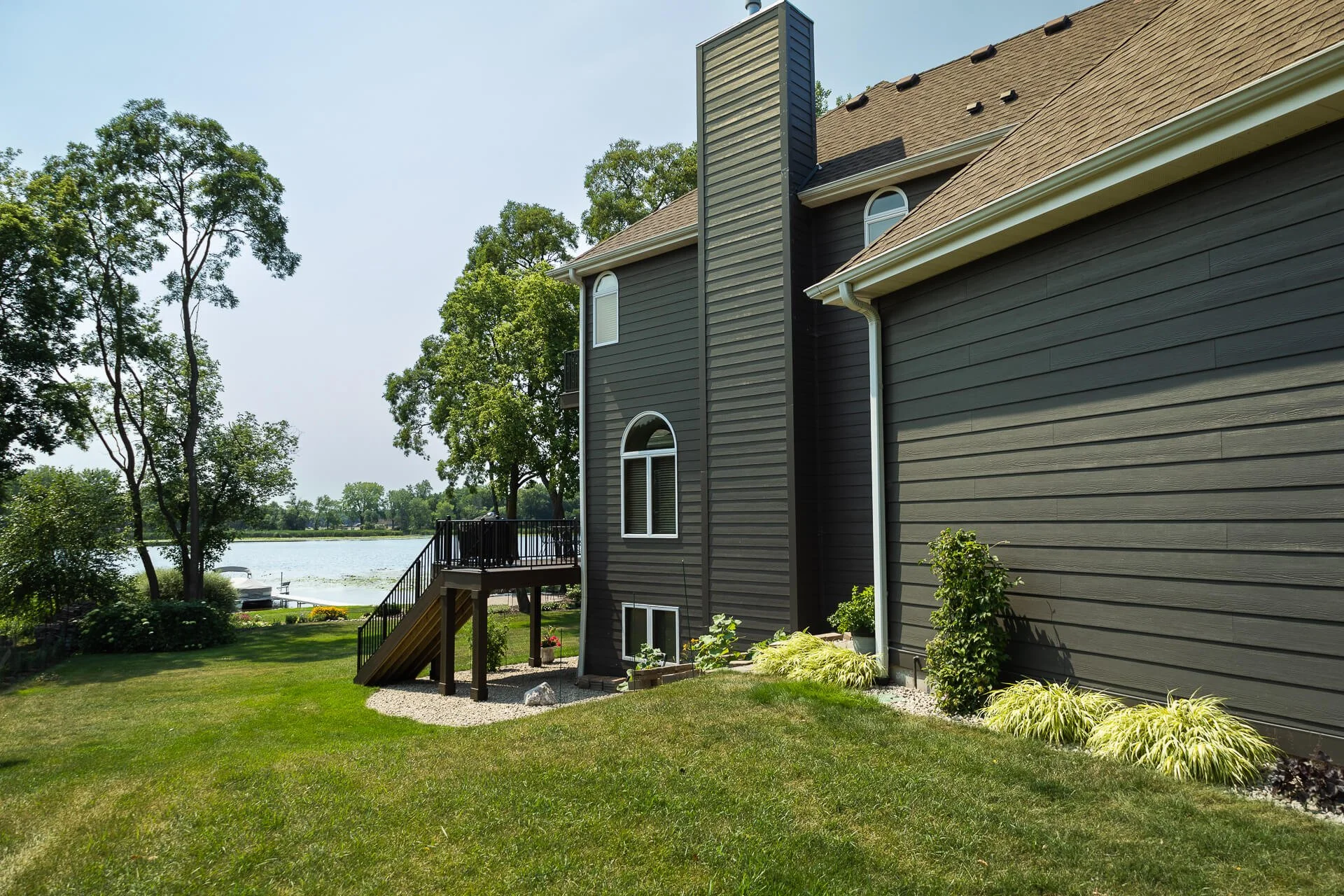 James Hardie Espresso Lap Siding Job — Voyager Siding and Decks