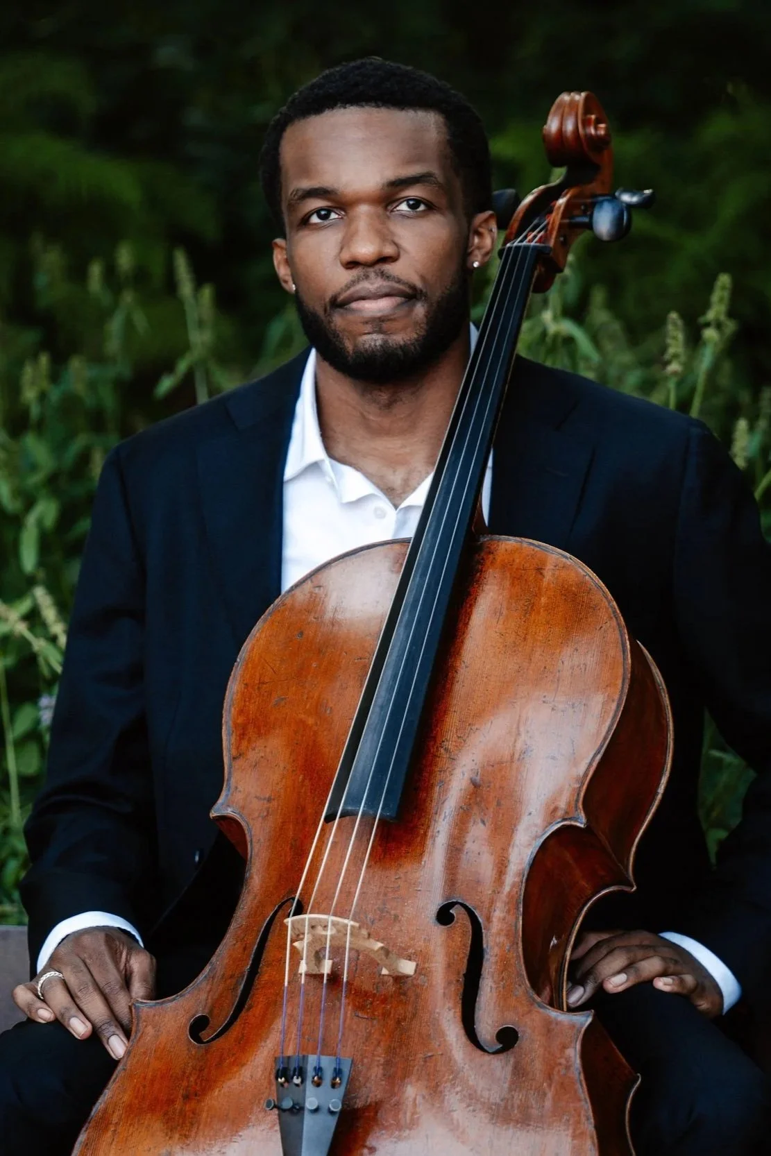 Joshua McClendon headshot with cello
