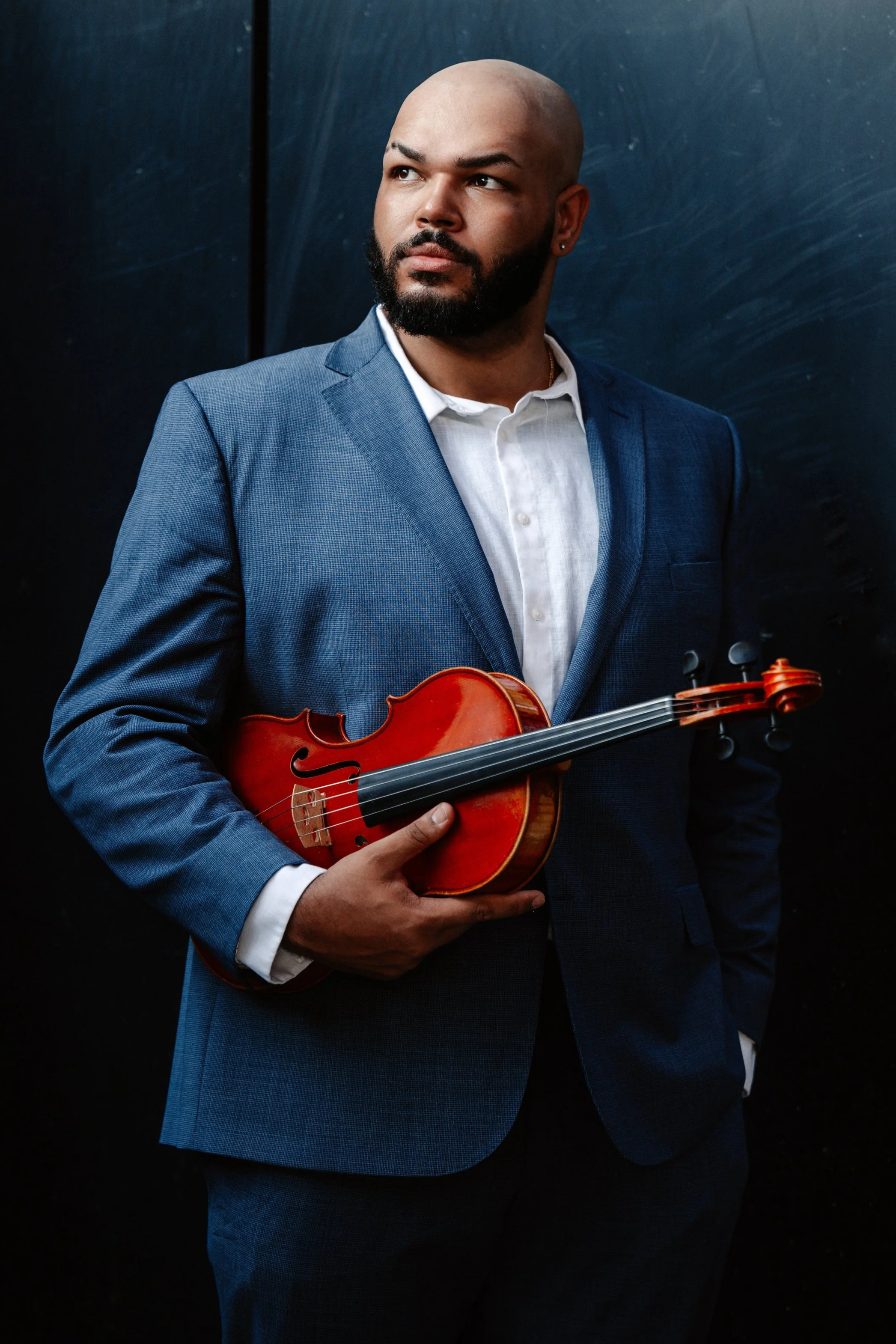 Devin Moore headshot with viola