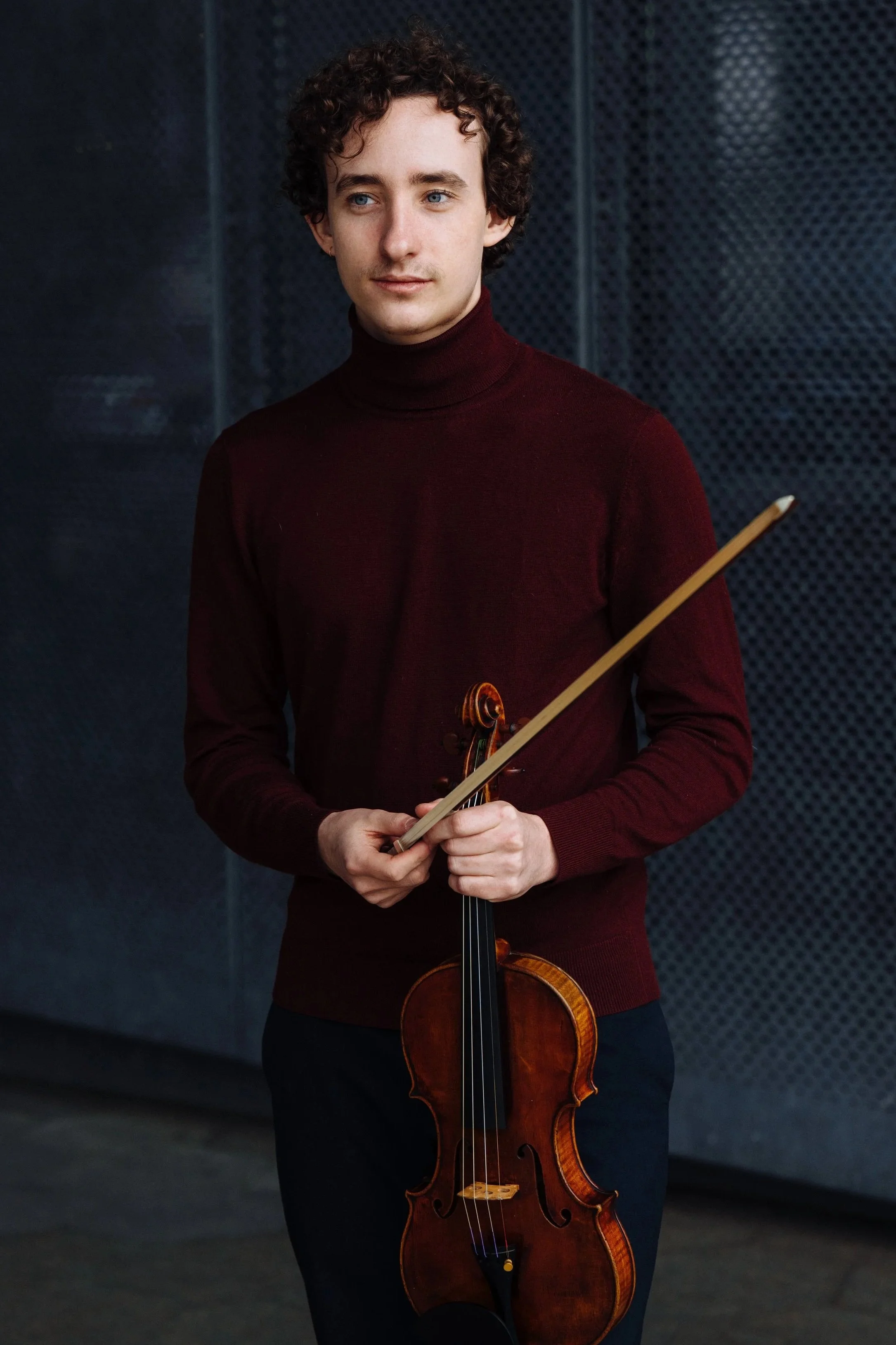 Phoenix Avalon headshot with violin