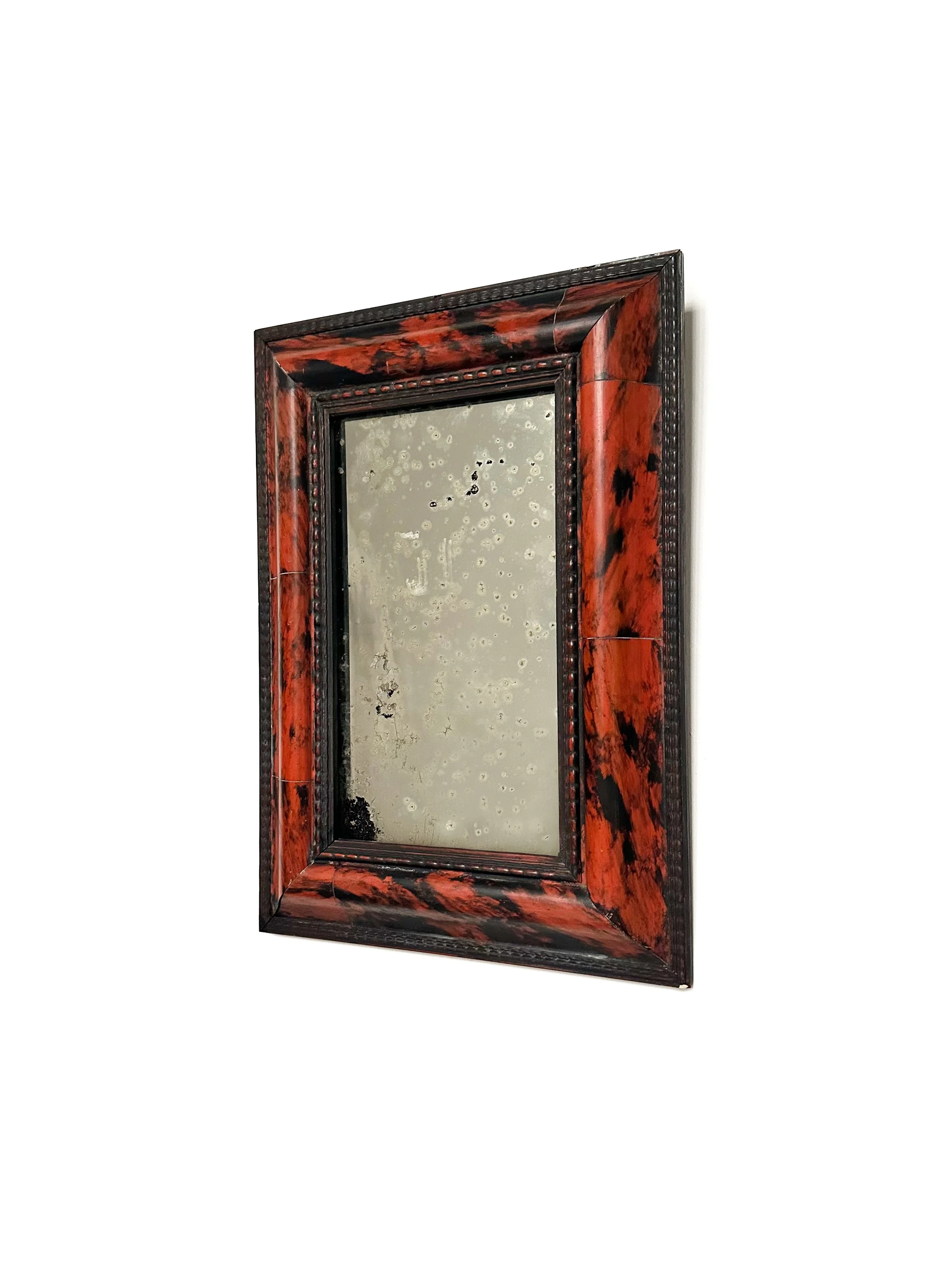 Small antique aged faux-tortoiseshell mirror.jpg