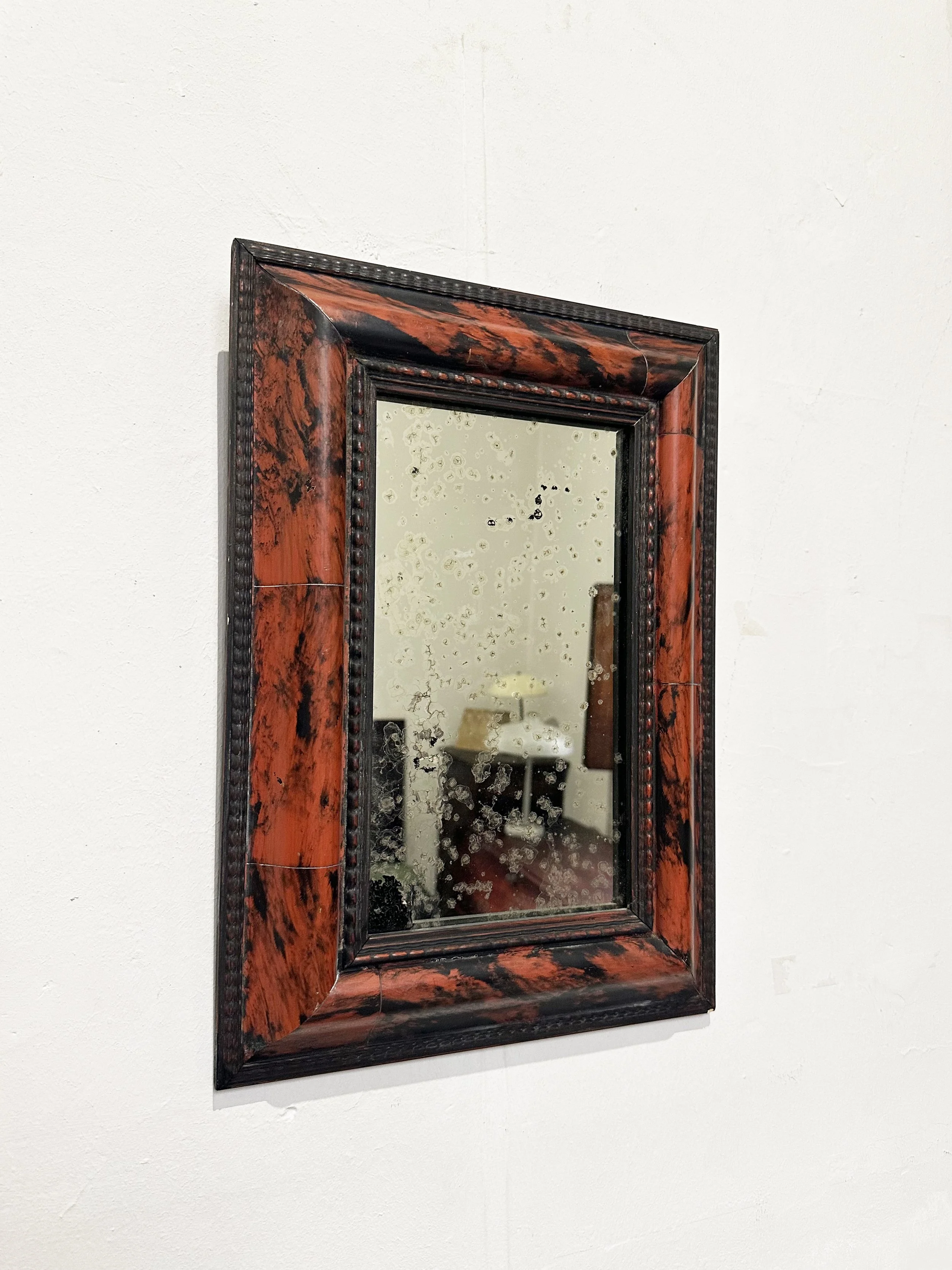 Small antique faux-tortoiseshell mirror.jpg