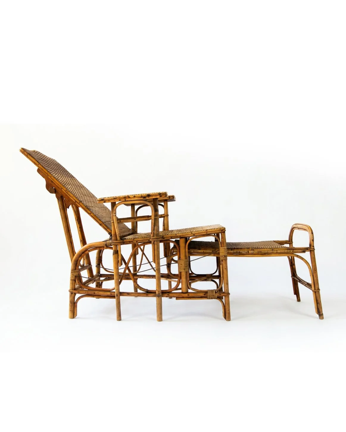 Antique French riviera rattan lounge chair.jpg