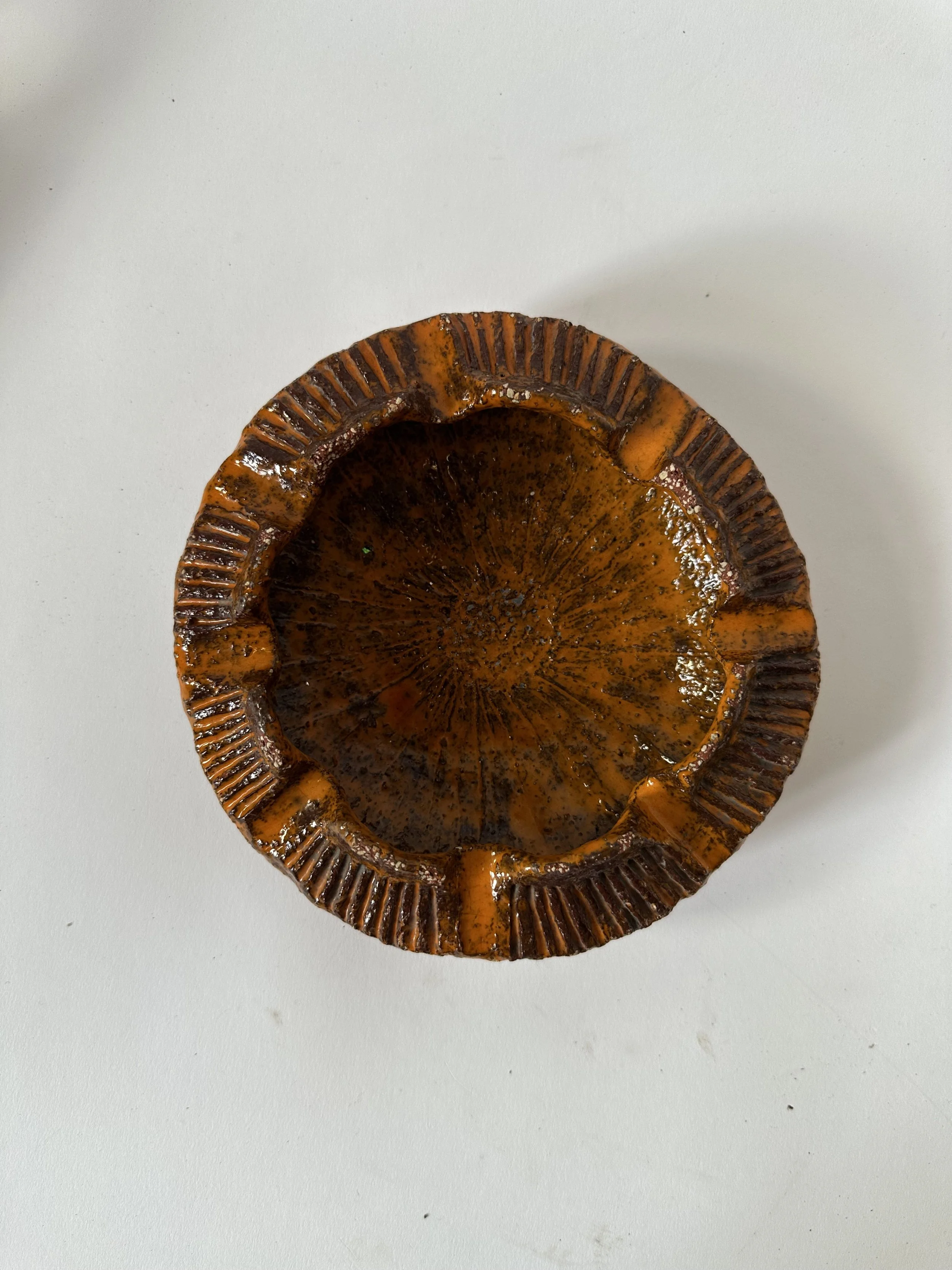Mid century pottery dish in orange.jpeg