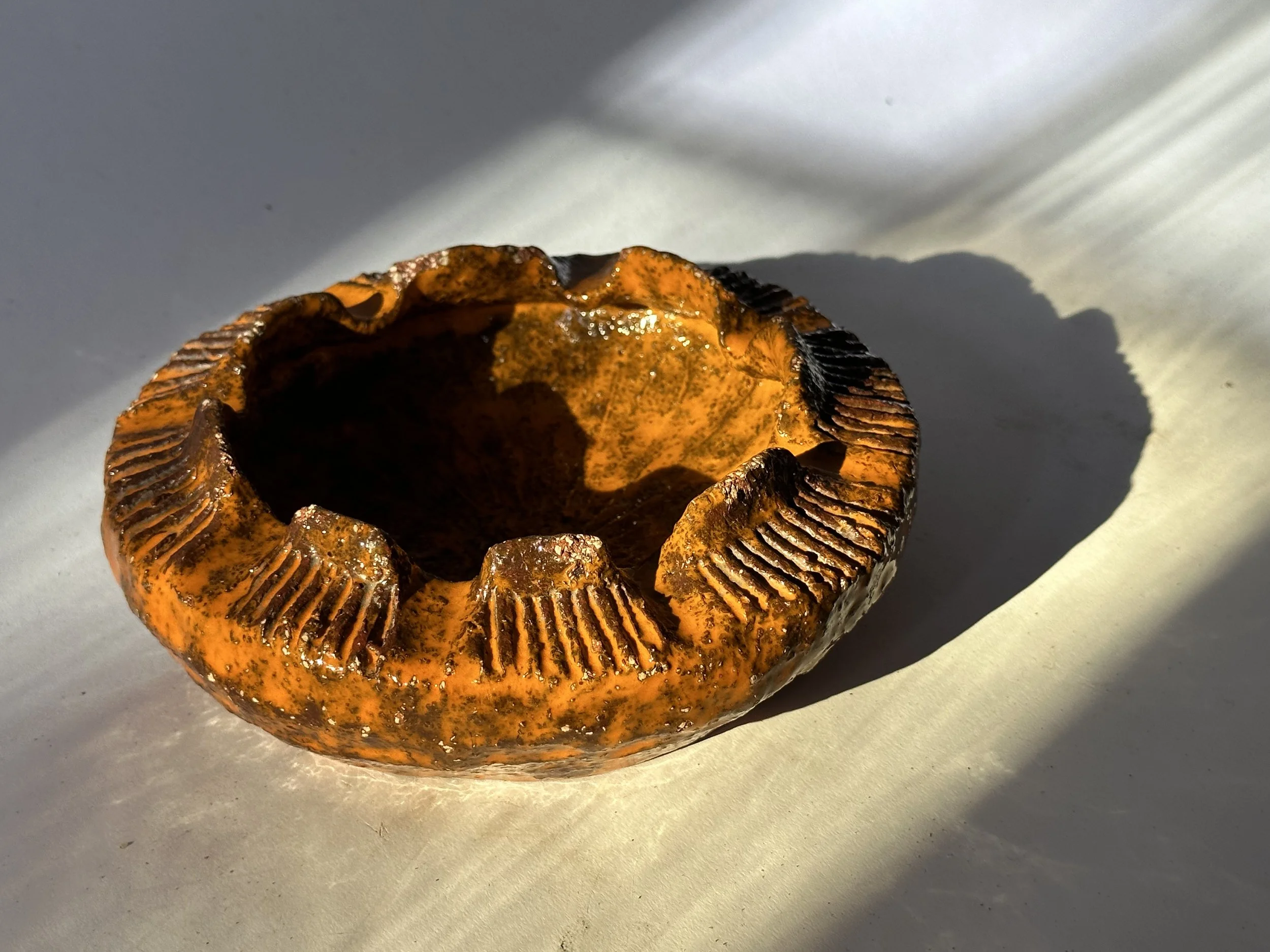 brutalist artisan pottery dish or ashtray signed.jpeg