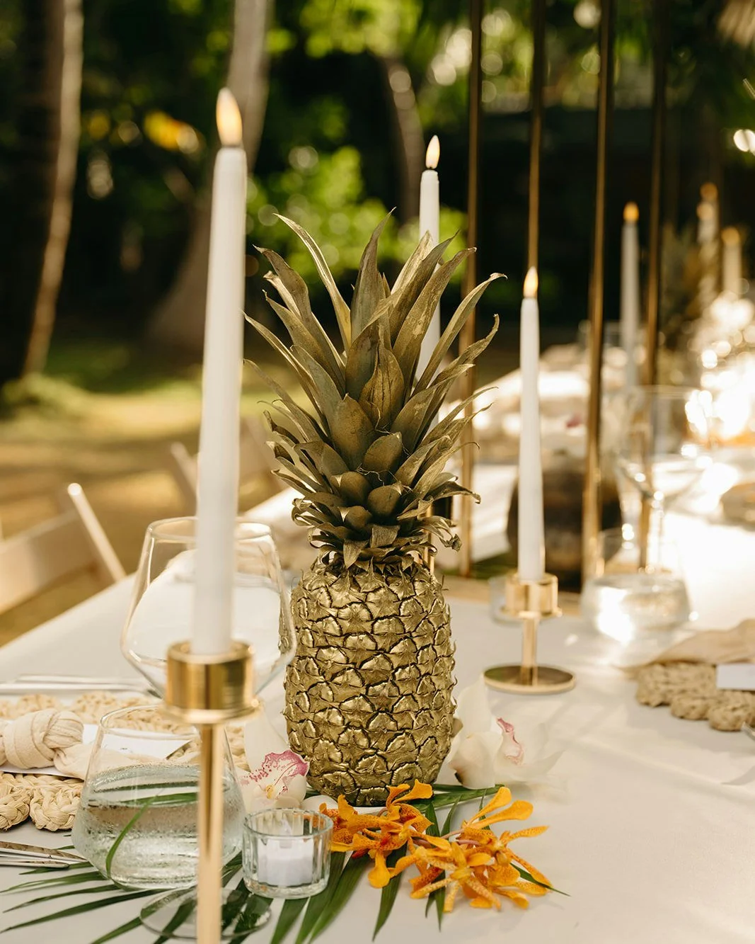 A tropical tablescape with golden accents that compliment a Hull Bay sunset never goes out of style. Our team of recommended vendors never miss the mark! 

Talk with our in-house planner today about how we can help make wedding planning a breeze! Pla