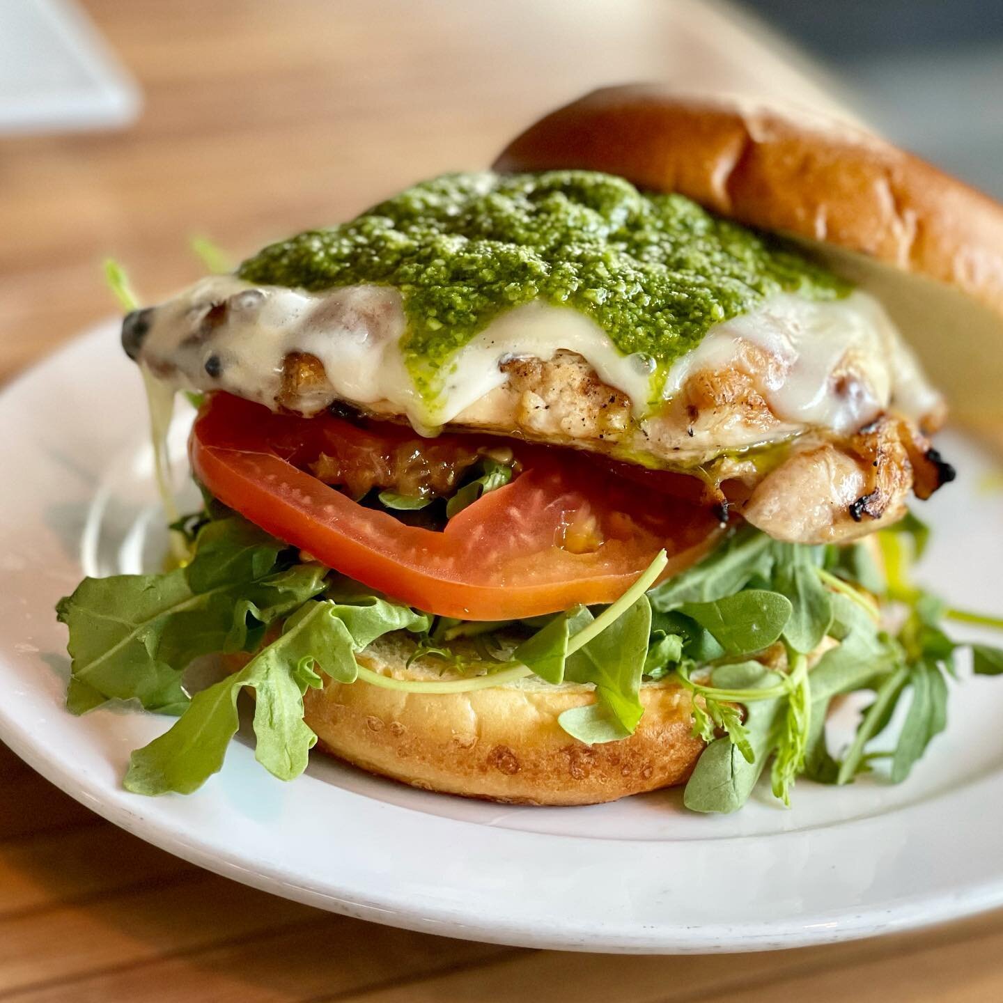 Our delicious Chicken Caprese Sandwich with grilled chicken, provolone, pesto, tomato and arugula. We are open at 11am. 
@missionfarms #chickencaprese #bestsandwich #eatlocal #eatlocalkc #grilledchickensandwich