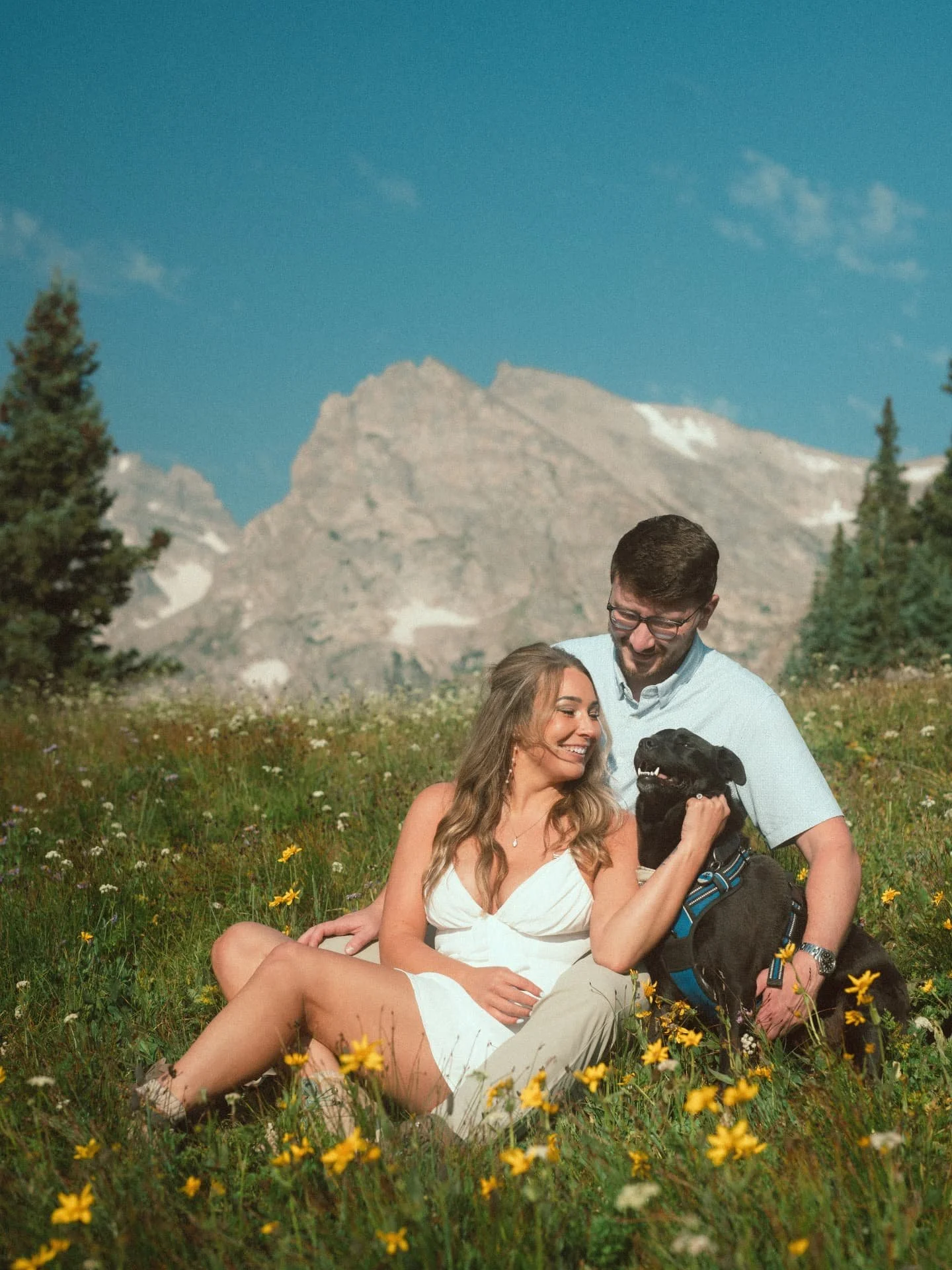 Hiking at 11,000 feet during an engagement session and landing in a field of wildflowers should be added to your bucket list. Like, now.