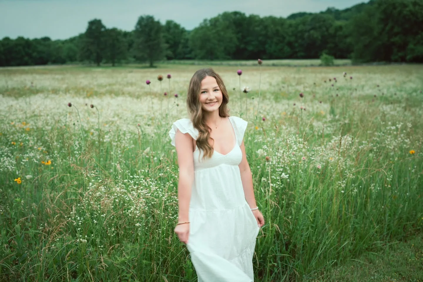 It took a while, but winter finally got here and it's been a rough week. So here's a senior photo session to help get you through the cold weather and remind you that pretty flowers and lush greens are just a couple of months away.