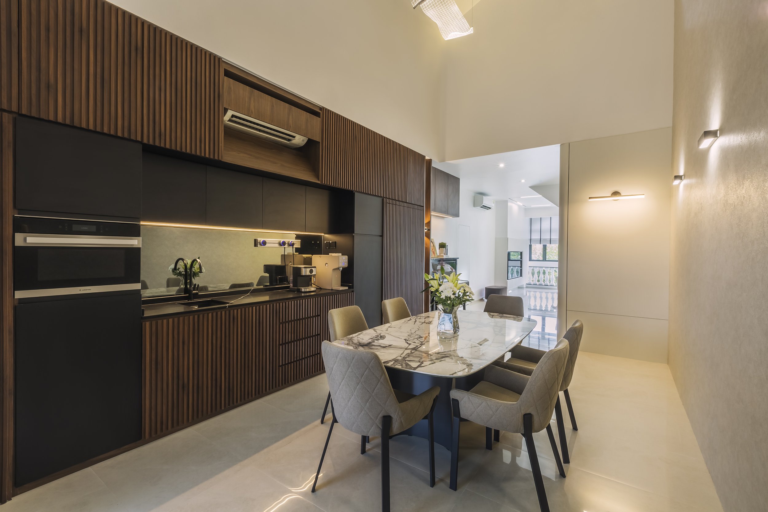 Luxury dining area in Sin Ming Bishan condo with modern European interior design, refined detailing and elegant spatial planning by Sketchworkdesignstyle Singapore