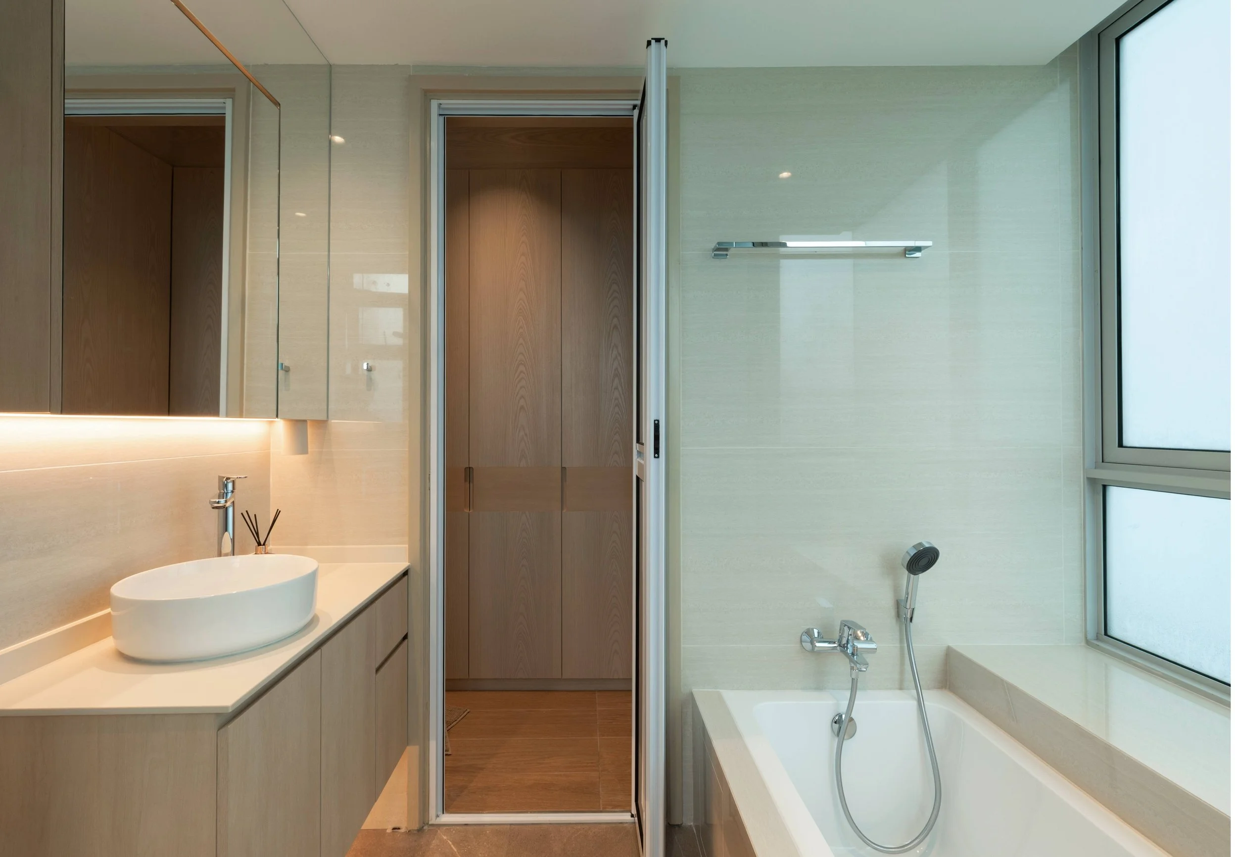 MUJI-inspired master bathroom at Kovan Melody Condo Singapore with clean lines, neutral tones and minimalist interior design