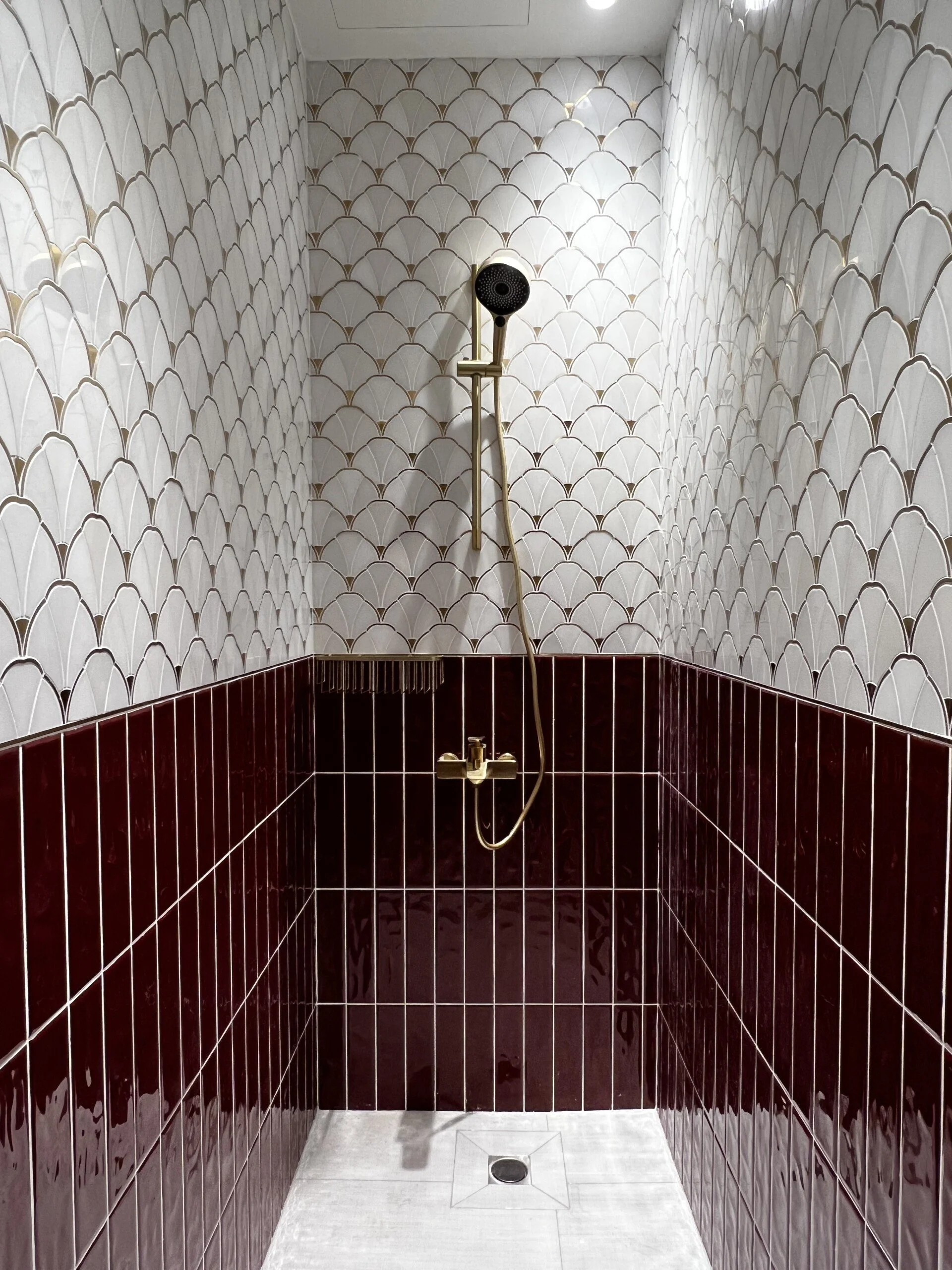 Powder room at Hillcrest Bukit Timah featuring bold materials, statement finishes and a modern Chinese European fusion design with refined detailing