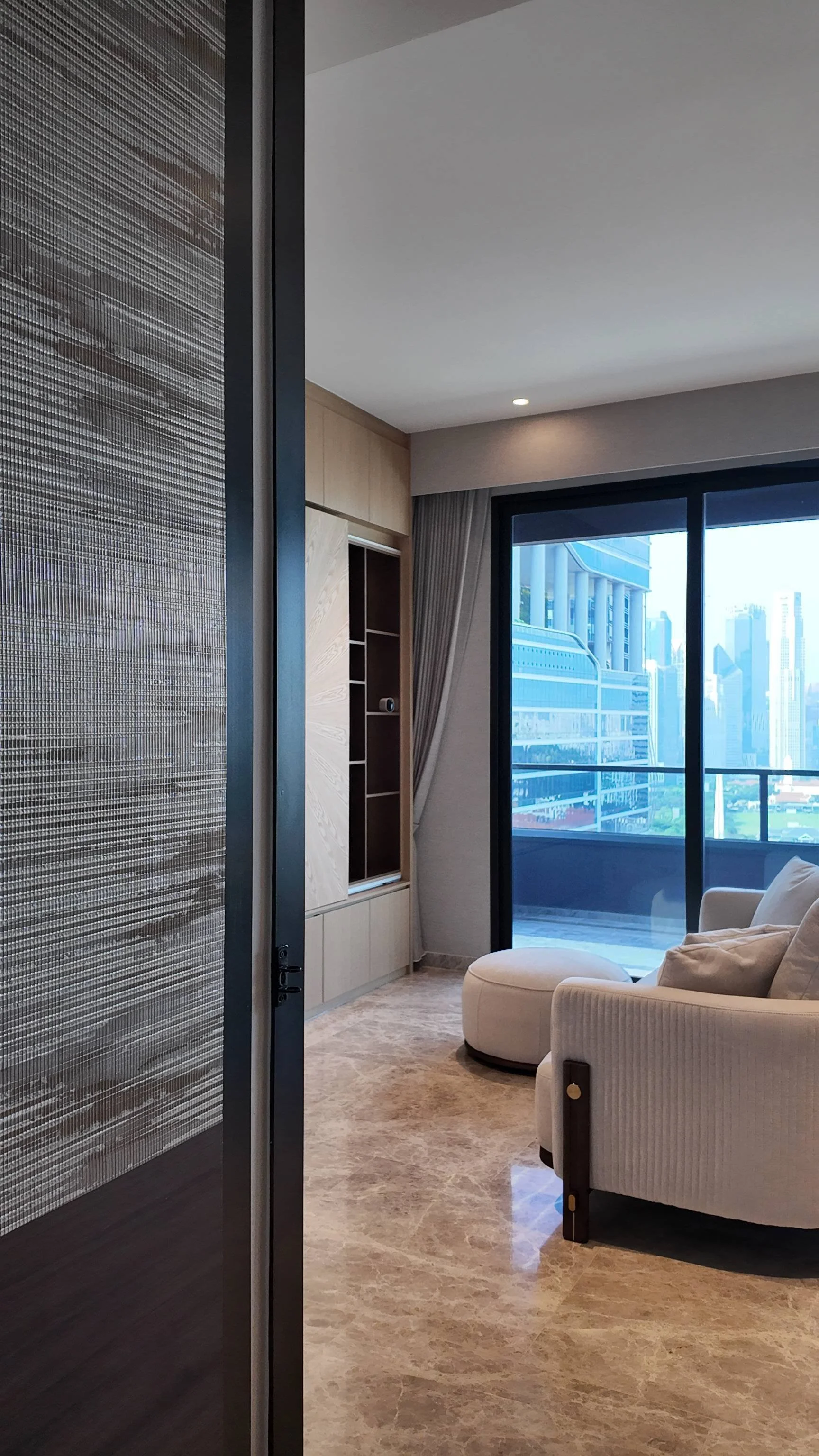 Master bedroom design at Midtown Modern Singapore with calming tones, built-in wardrobe and a clean modern aesthetic
