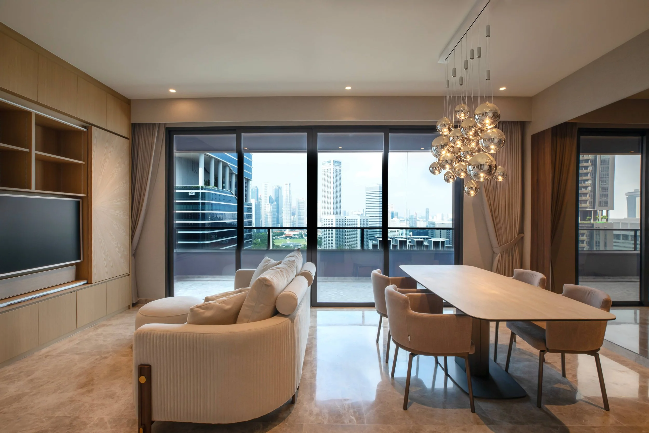 Midtown Modern condo interior design in Singapore with refined modern living room, warm tones, clean lines and thoughtfully planned layout by Sketchworkdesignstyle