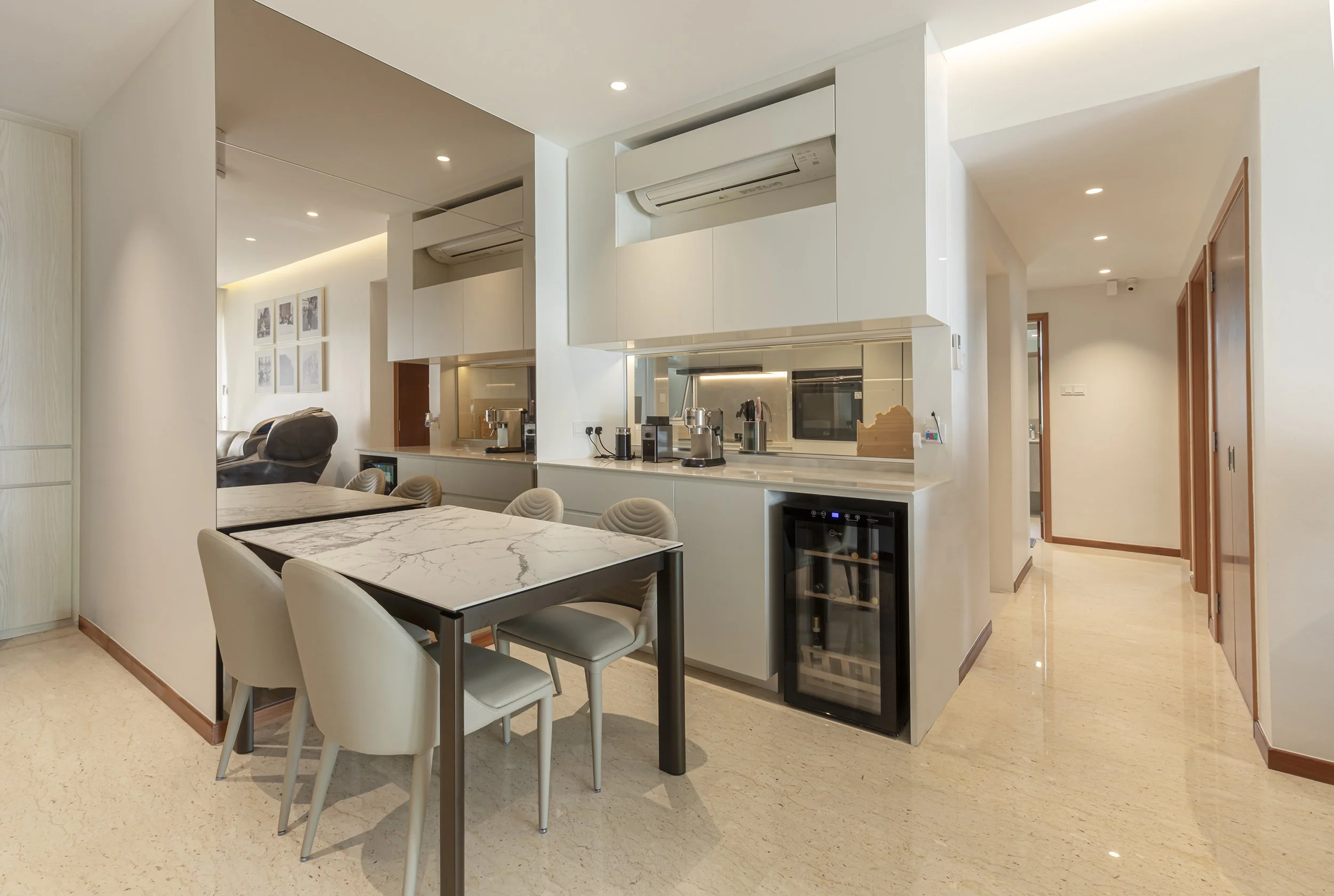 High-end living room interior at Sunglade Condo Singapore with modern European design, layered textures, custom-built furniture and sophisticated lighting