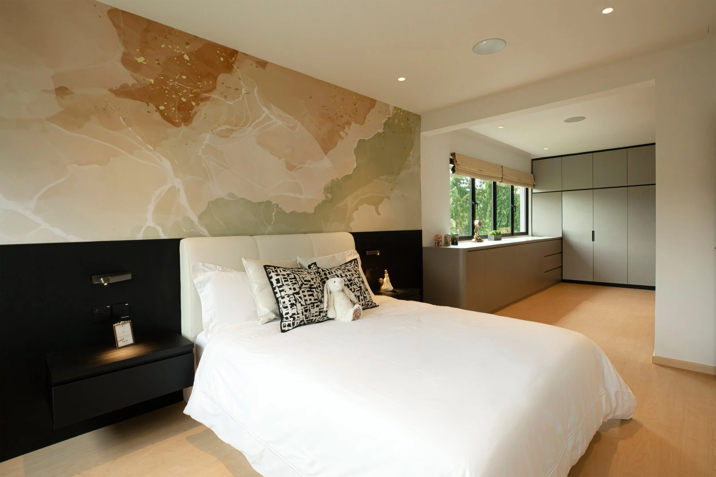 High-end Japanese bedroom interior in Katong featuring warm textures, minimalist elegance and refined spatial planning