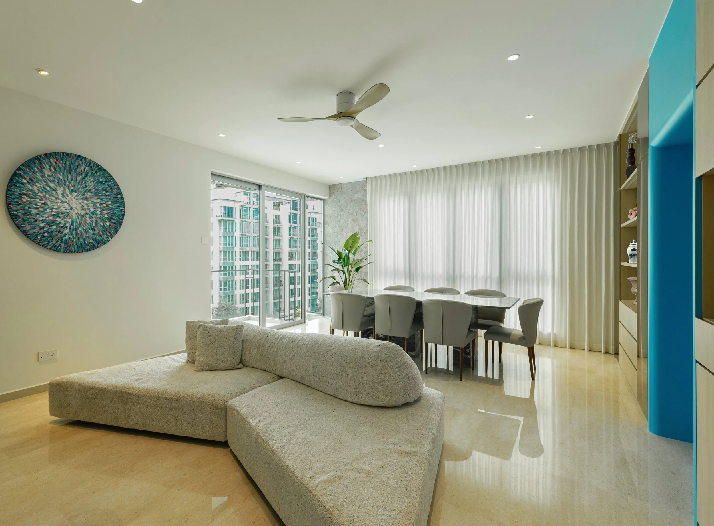 Modern coastal living room sea view at Keppel Bay Condo Singapore with luxury interior design, airy layout, natural light and calming ocean-inspired palette