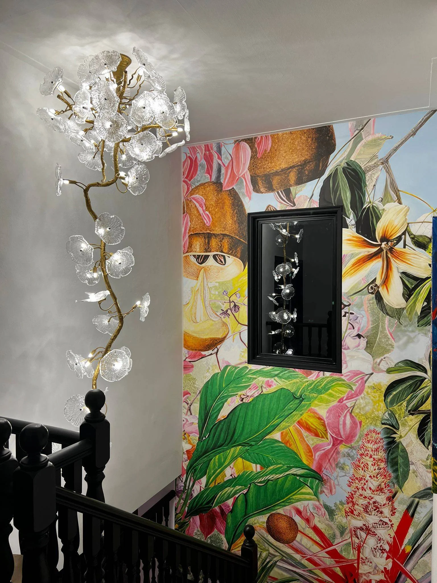 Staircase design at Hillcrest Bukit Timah with feature chandelier, vertical volume and expressive modern Chinese European fusion interior