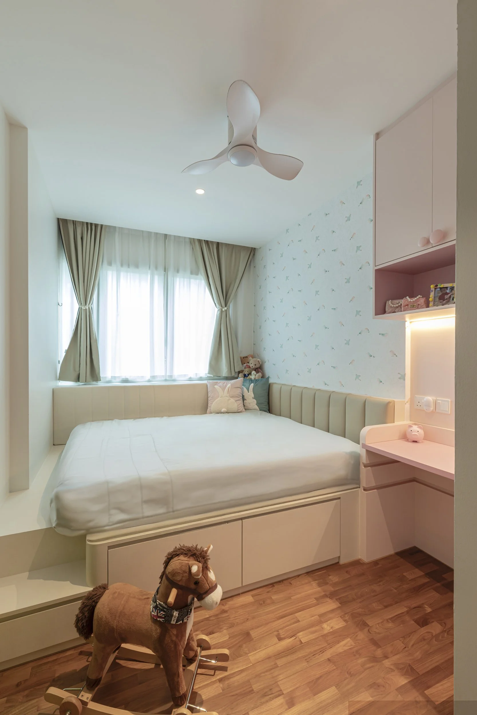 Daughter bedroom at Sunglade Condo Singapore with modern European design, gentle colour palette, elegant detailing and functional storage